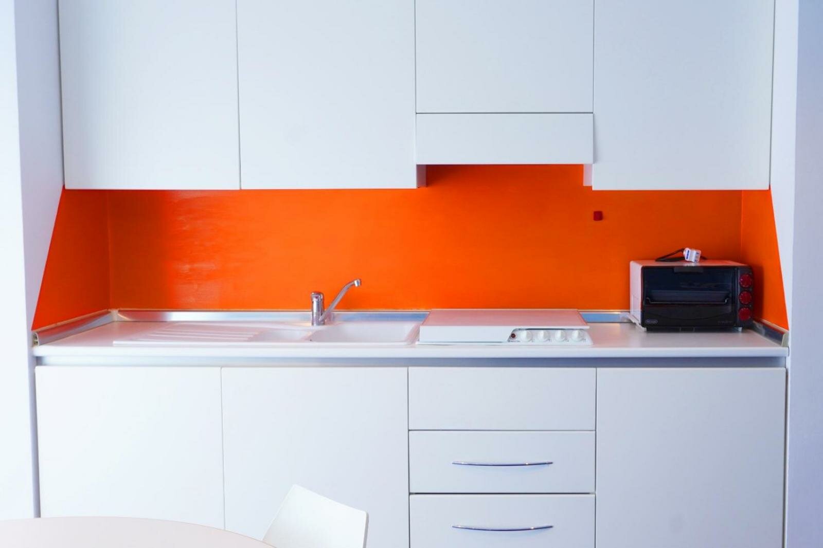 One-Bedroom Apartment with Balcony and Lateral Sea View