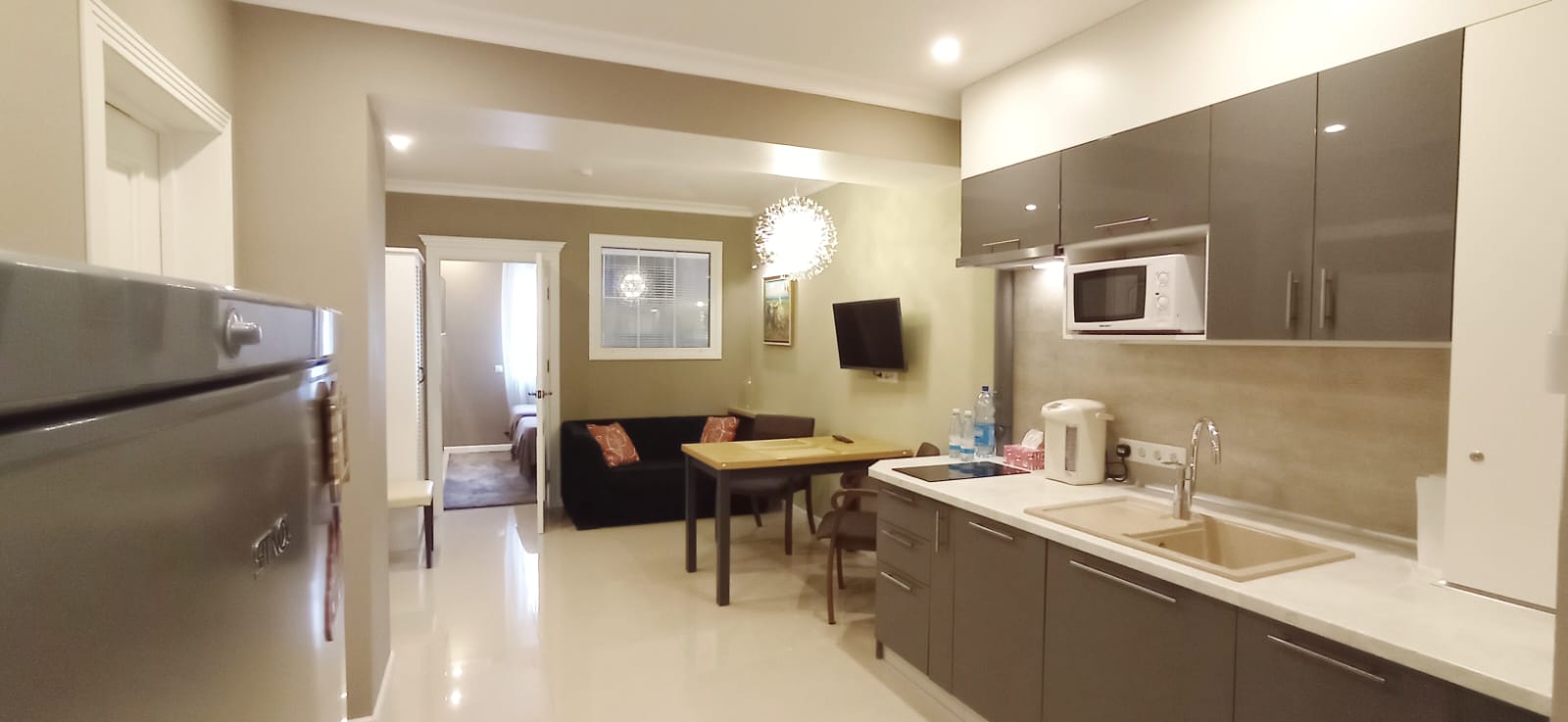 Апартаменты люкс с одной большой двуспальной или двумя отдельными кроватями и диваном