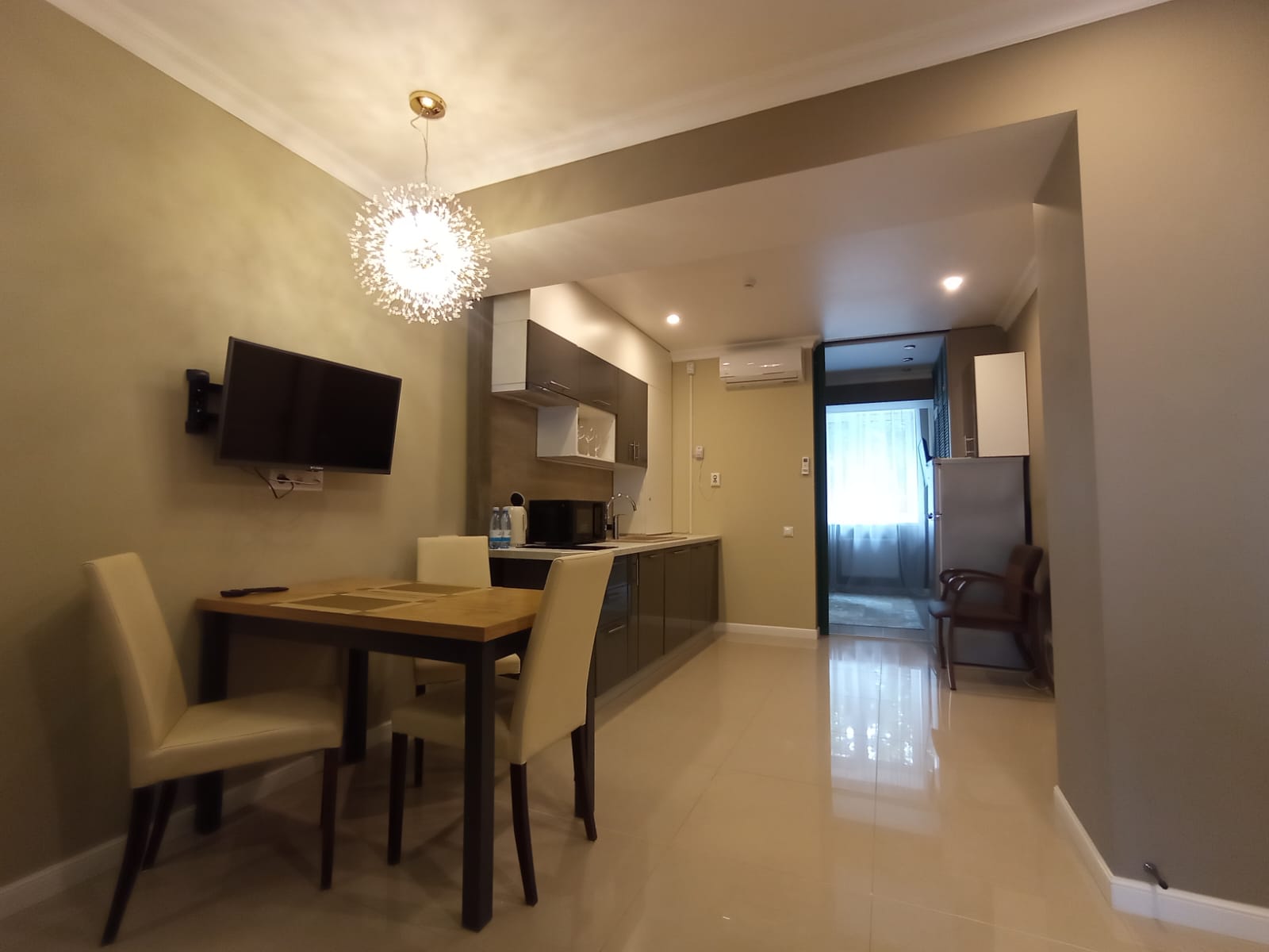 Апартаменты люкс с одной большой двуспальной или двумя отдельными кроватями и диваном