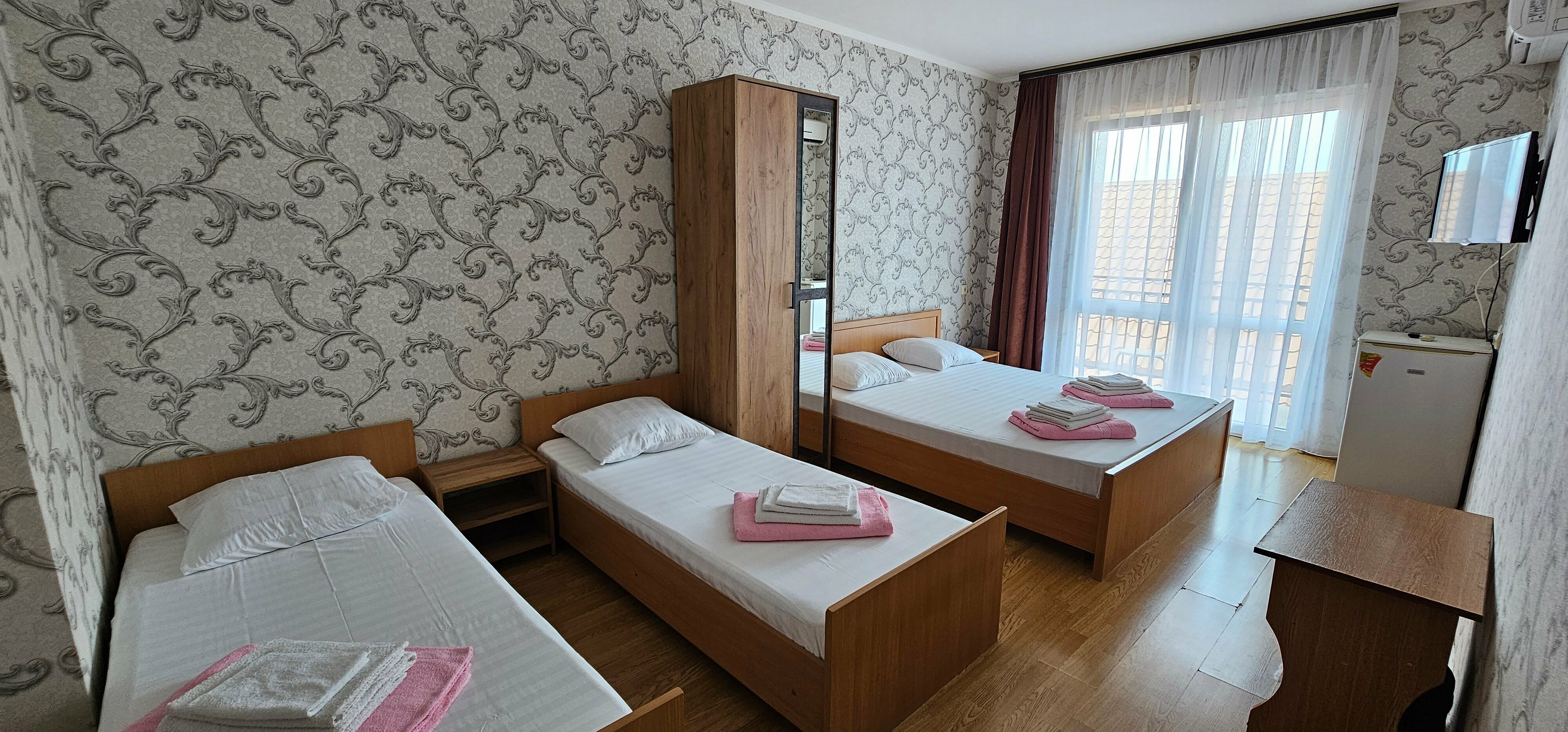 Четырехместный номер с балконом