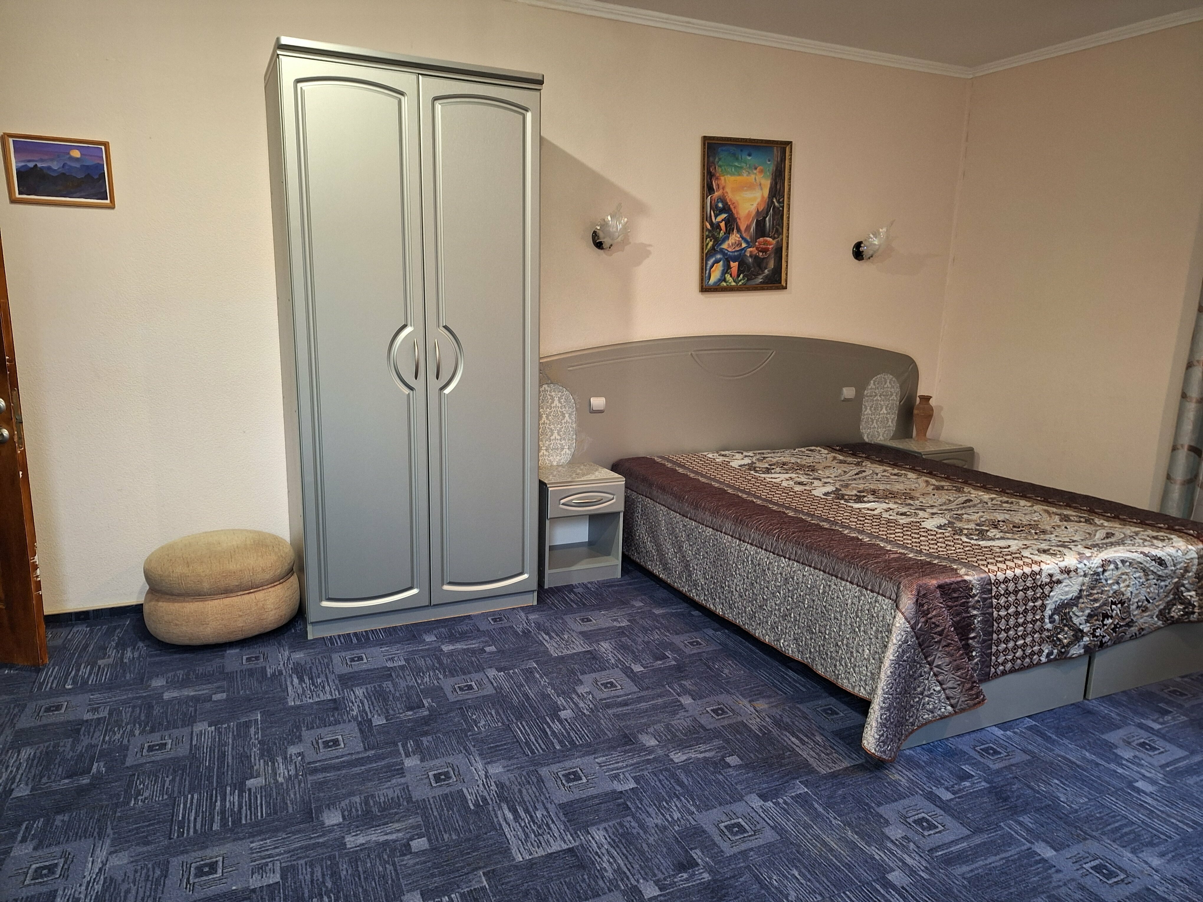 Трехместный номер с балконом