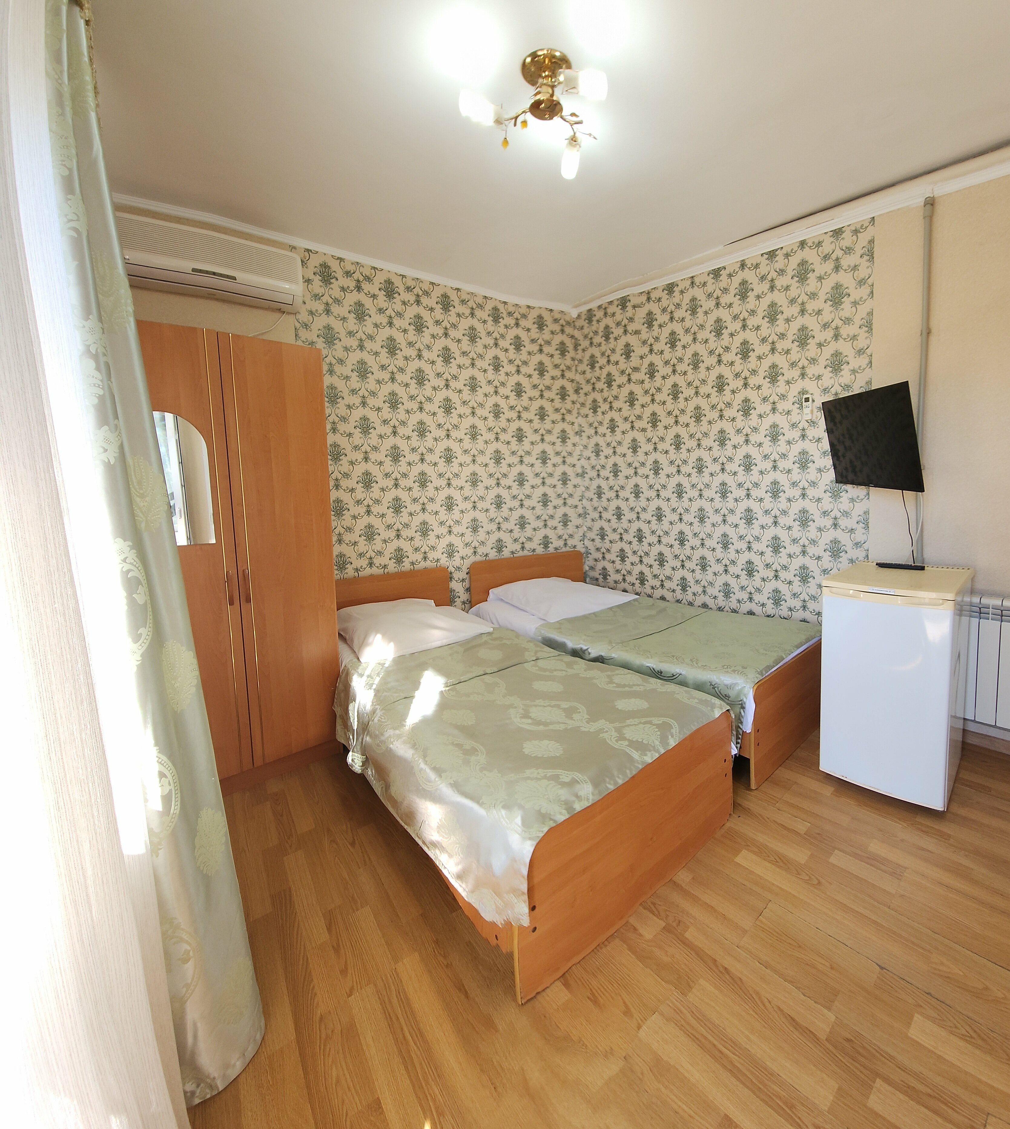 Двухместный номер с 2 отдельными кроватями и балконом