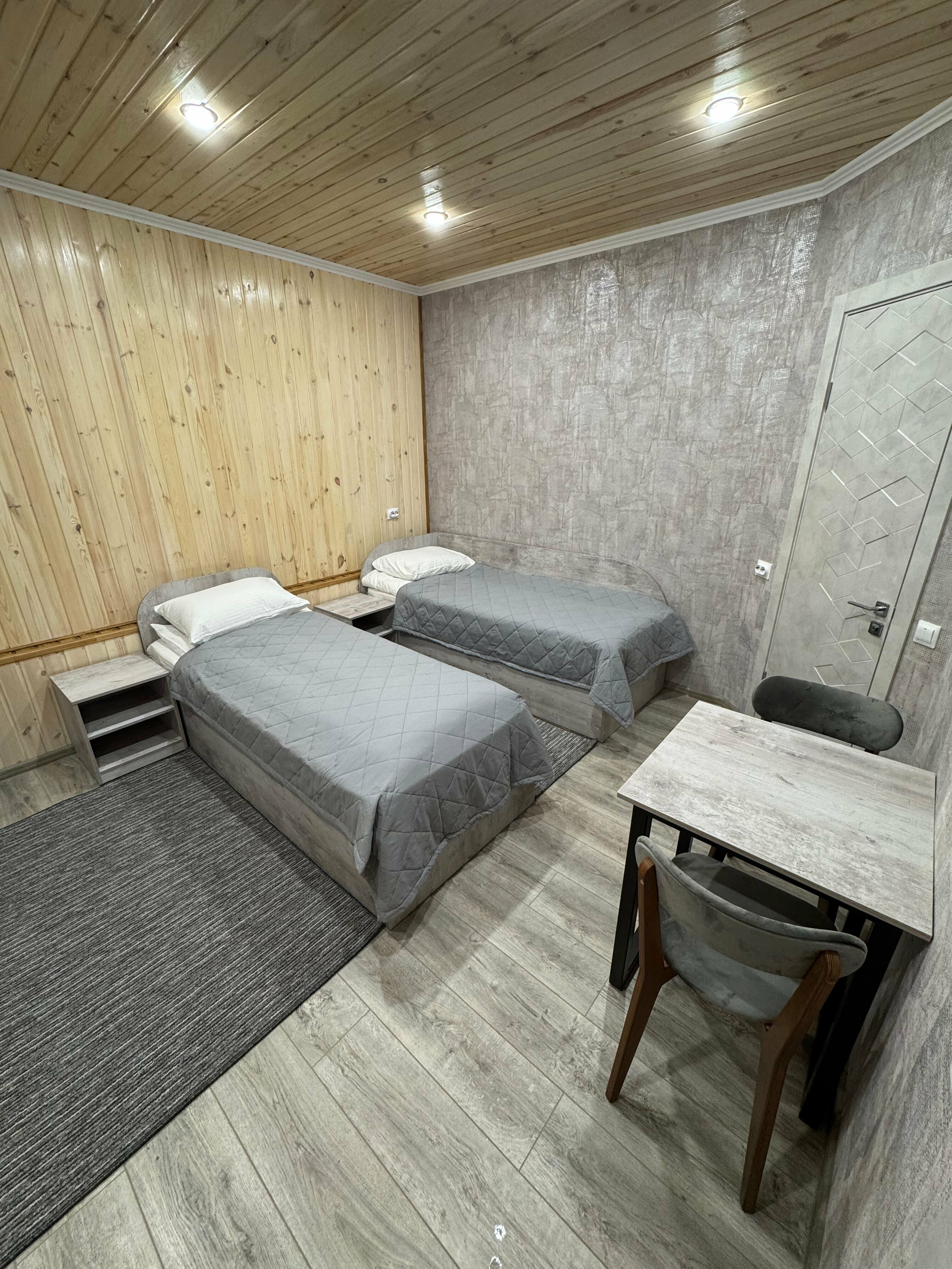 Улучшенный двухместный номер с 2 отдельными кроватями