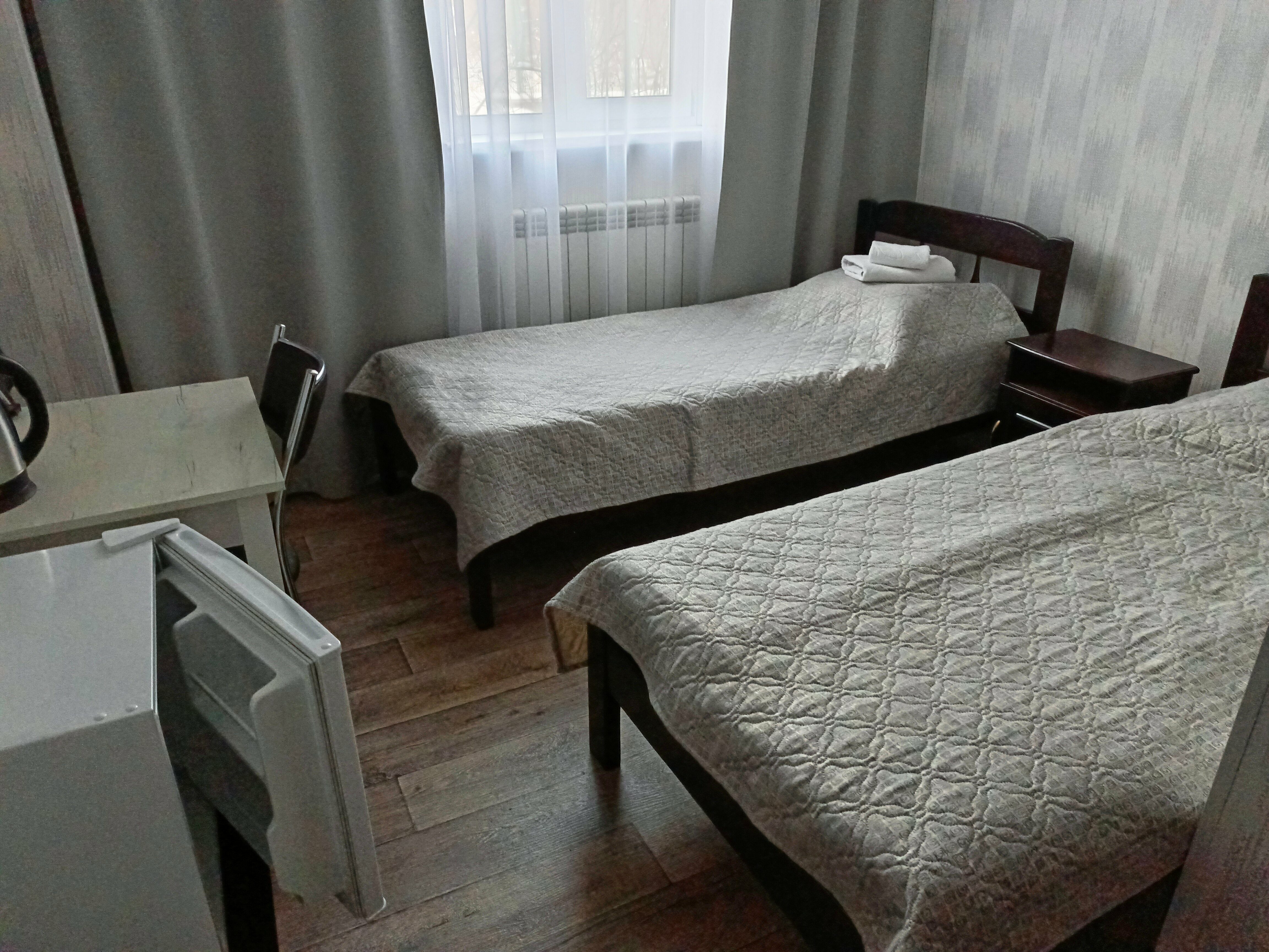 Двухместный номер эконом-класса с 2 отдельными кроватями