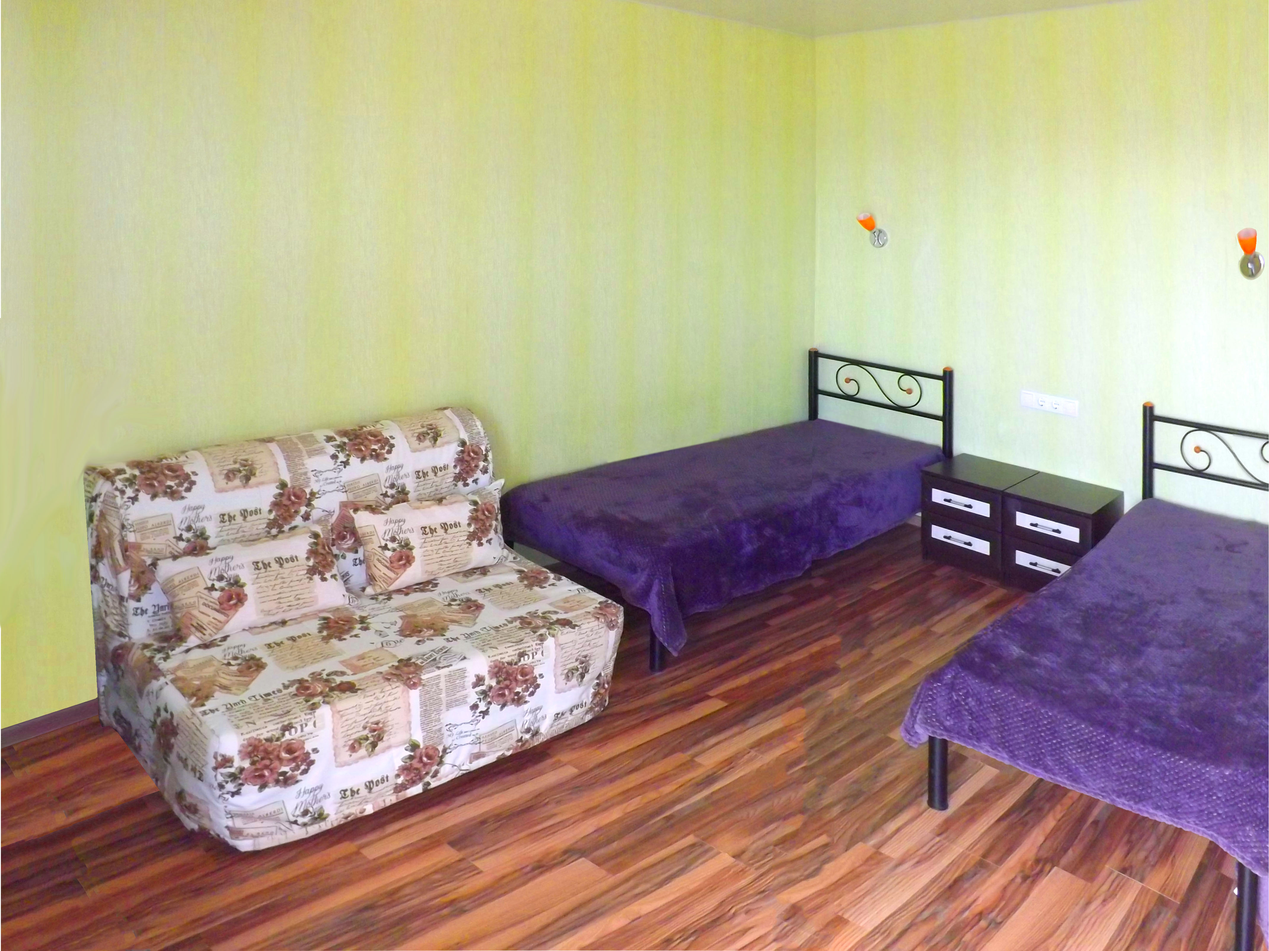 Семейный номер с боковым видом на море