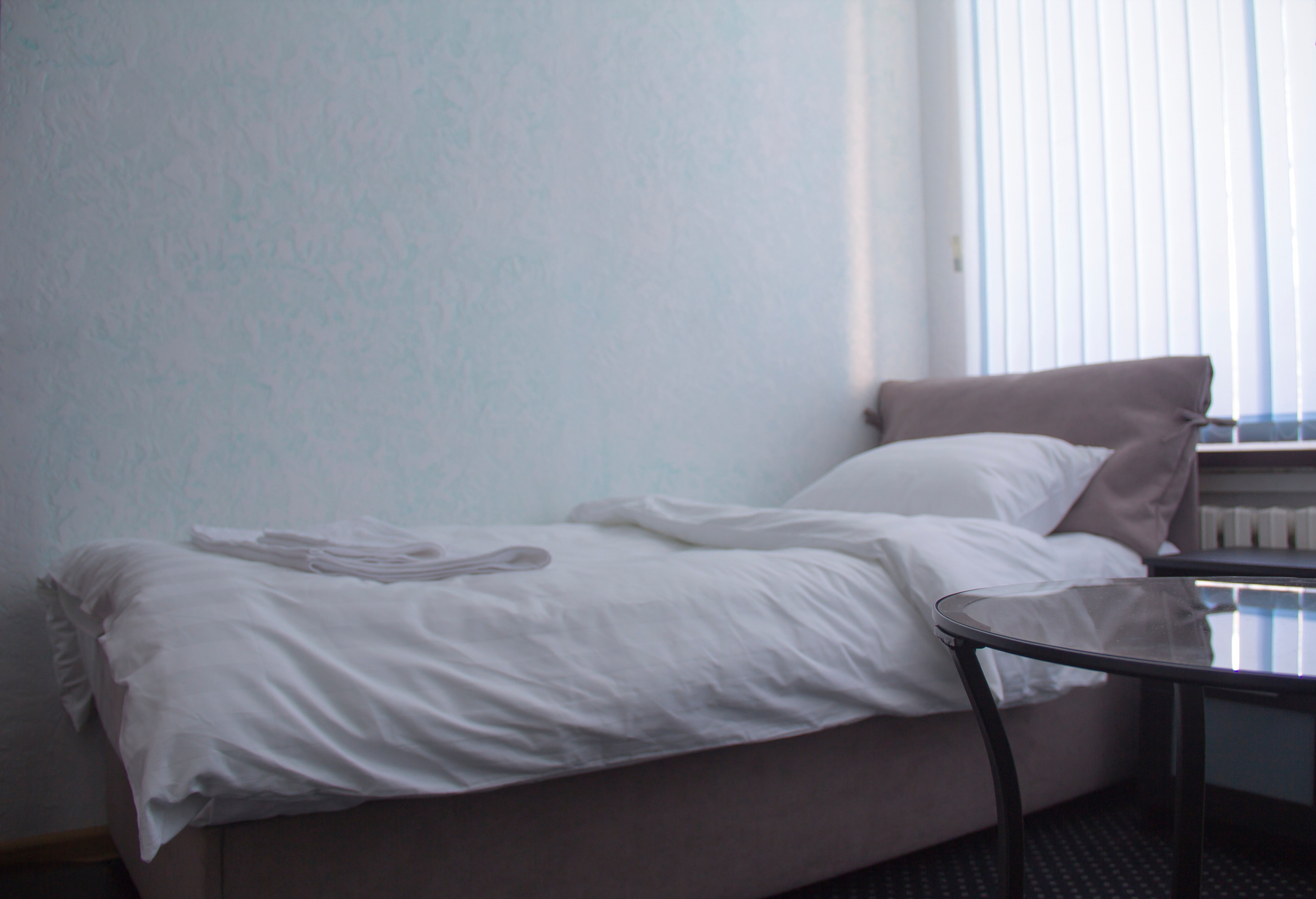 Двухместный номер с 2 отдельными кроватями и общим туалетом