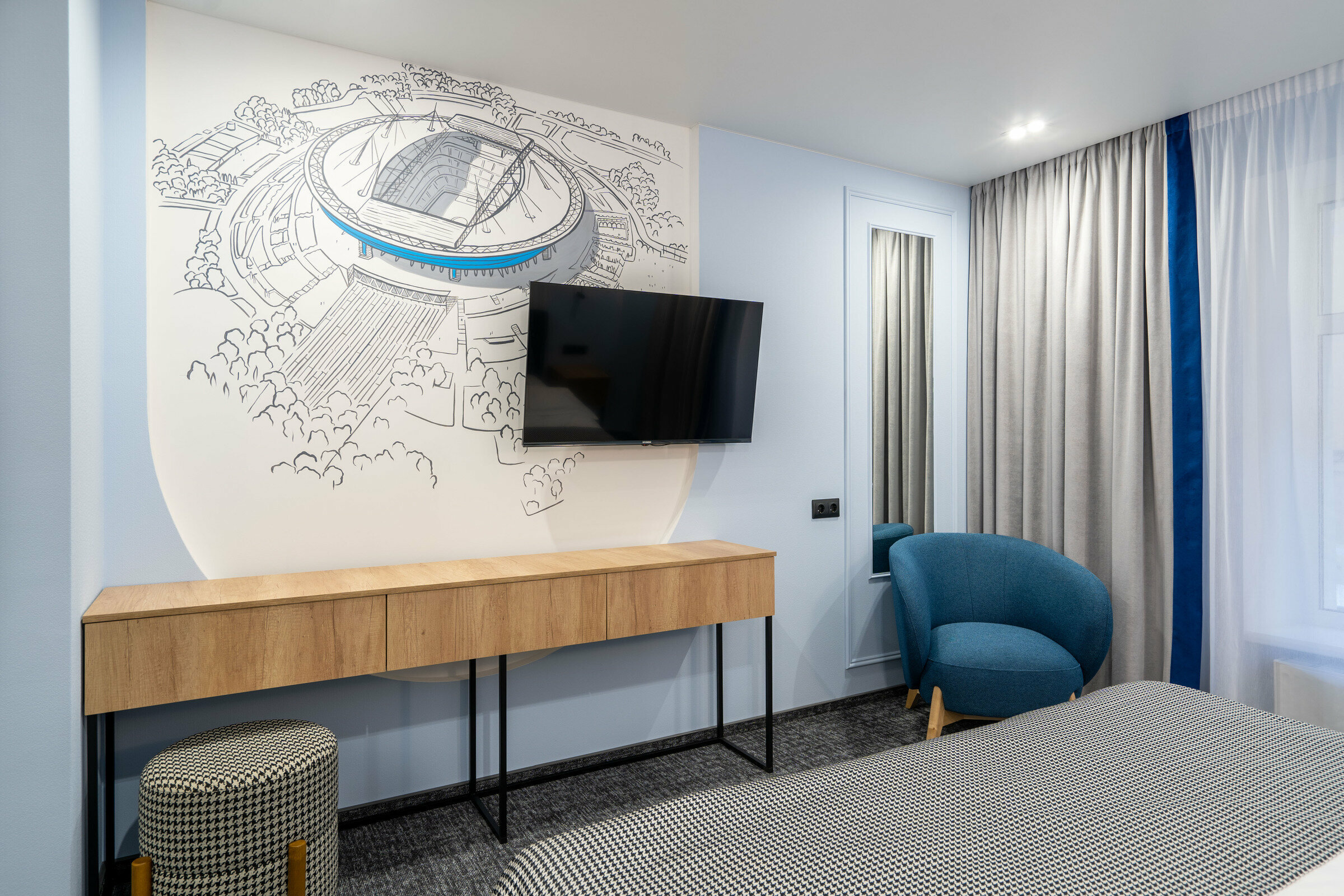 Улучшенный номер с большой кроватью «Спортивный».