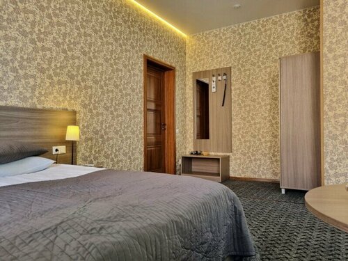 Трехместный номер Делюкс