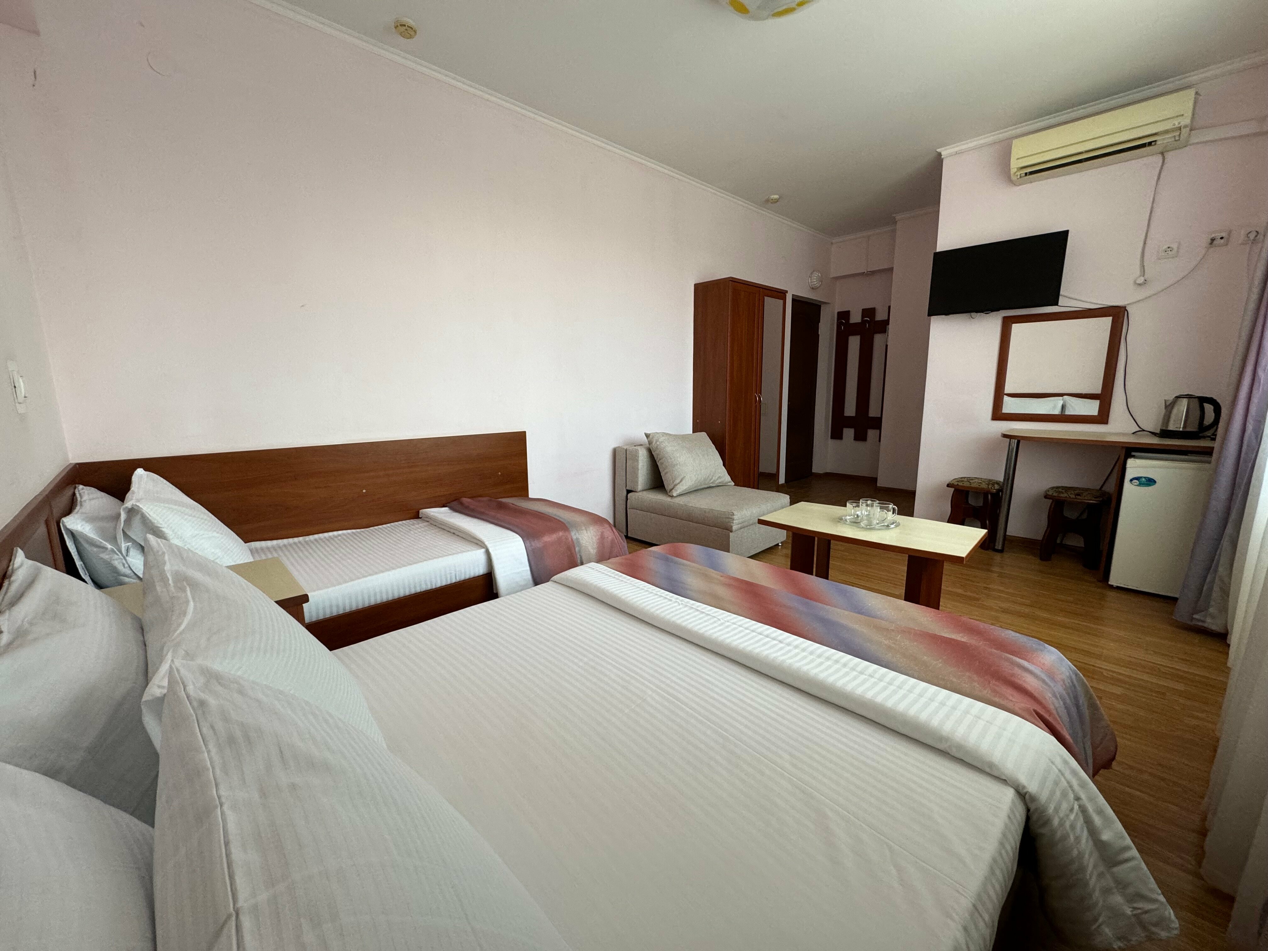 Четырехместный номер с балконом