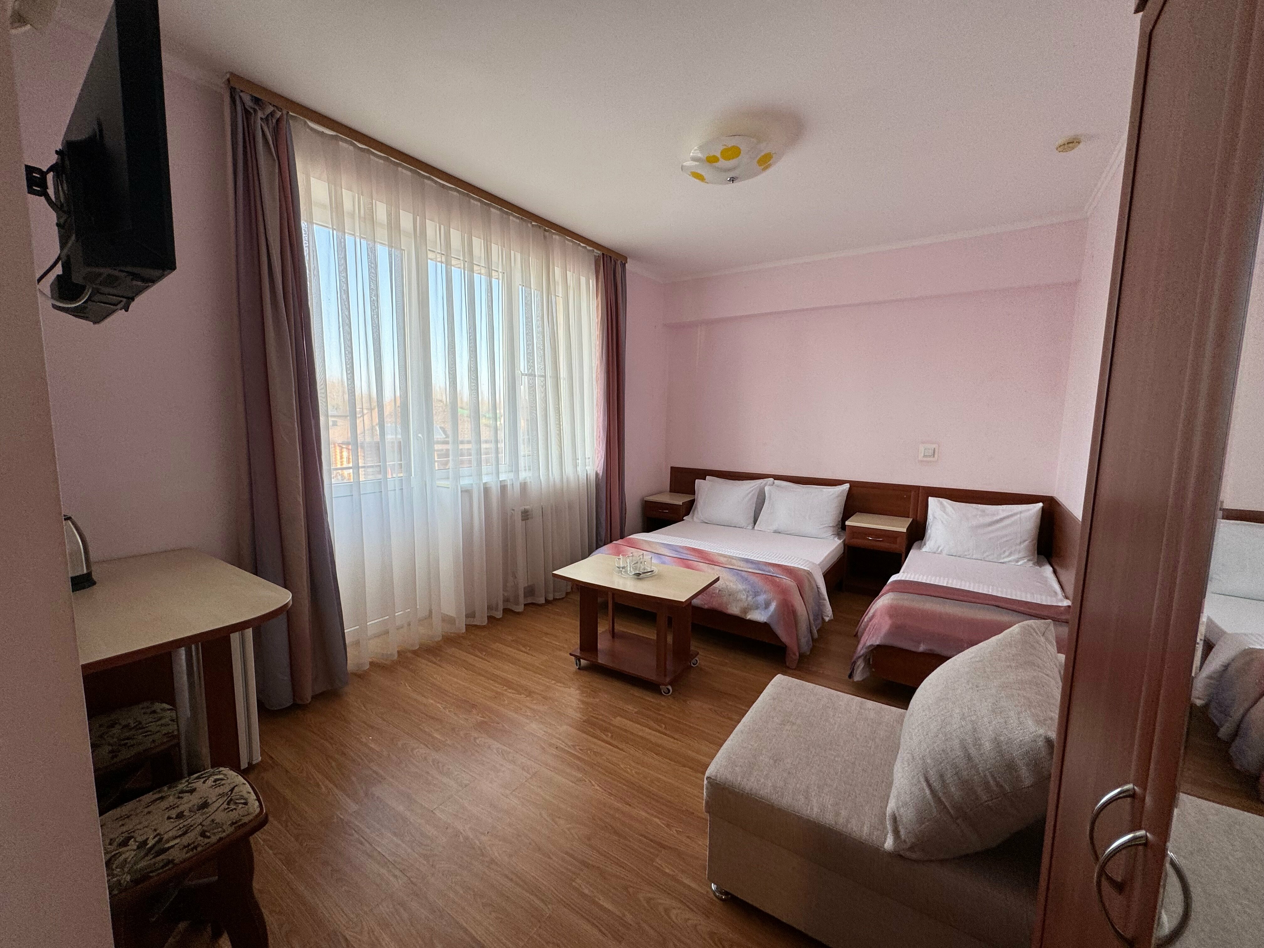 Четырехместный номер с балконом