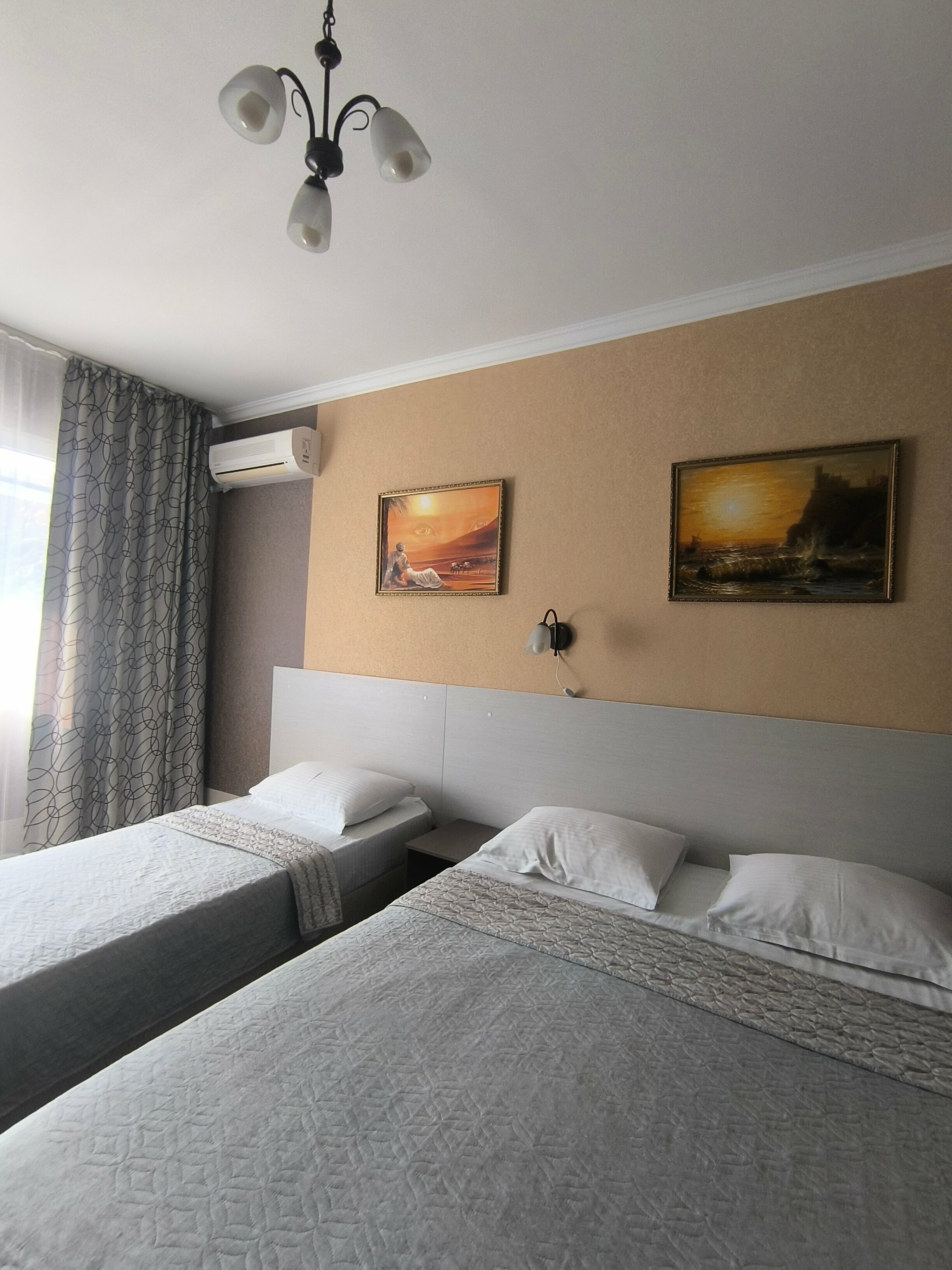 Трехместный номер с балконом