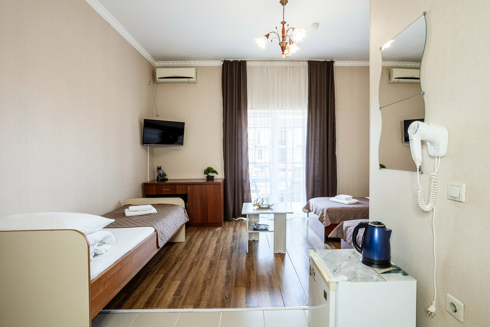 Трехместный номер с балконом