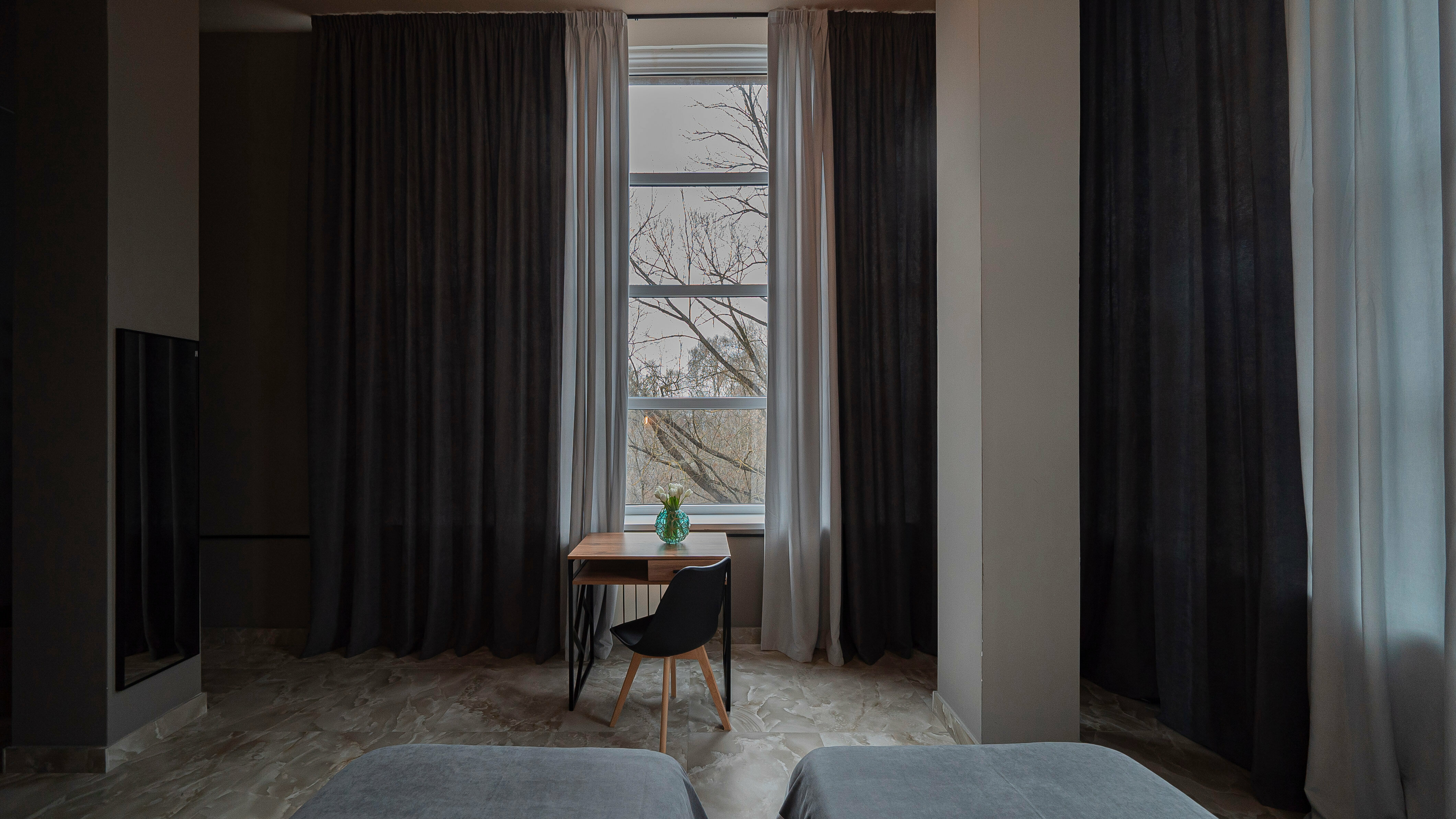 Двухместный номер с 2 отдельными кроватями и окном