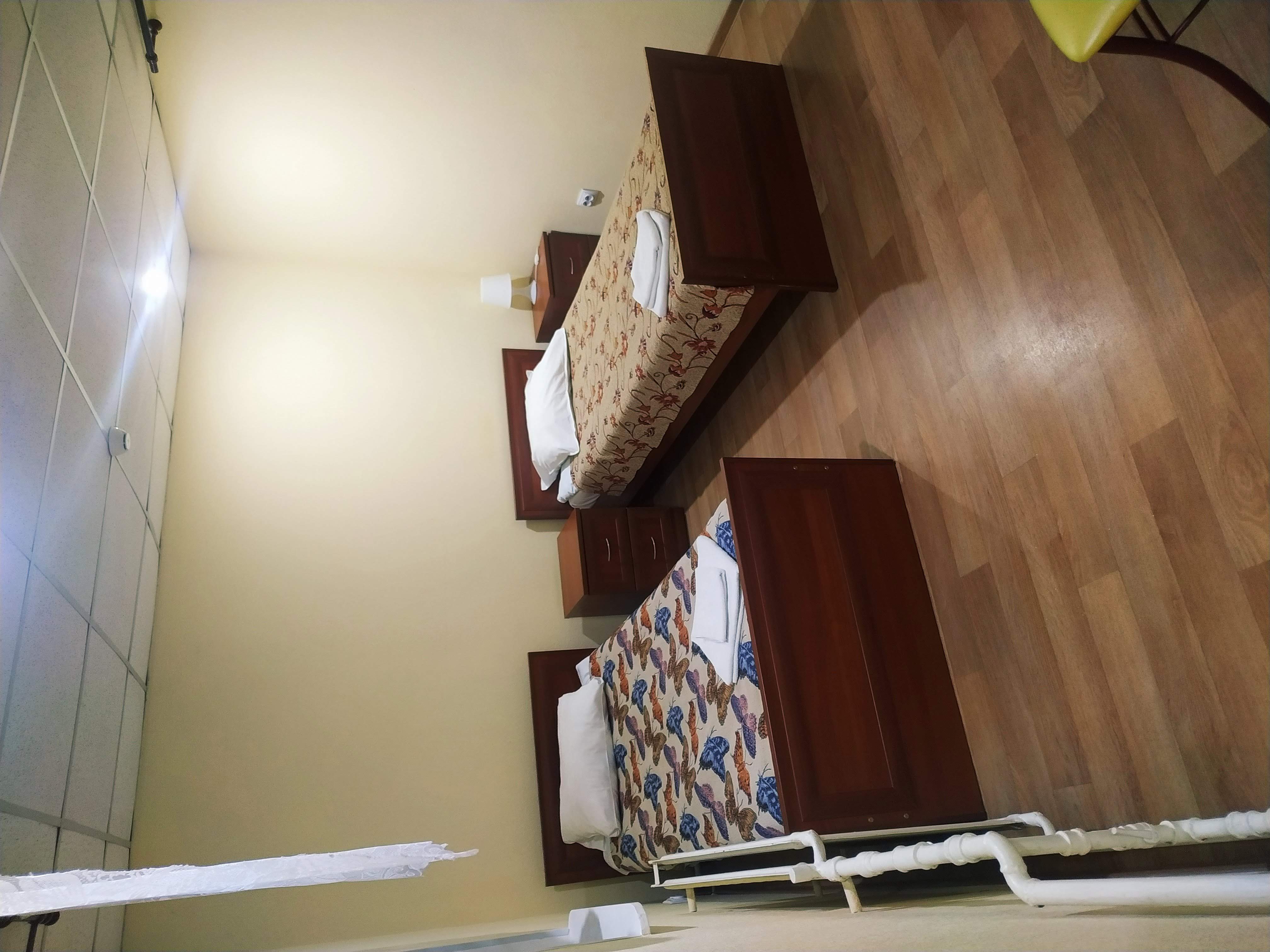 Четырехместный номер с видом на сад