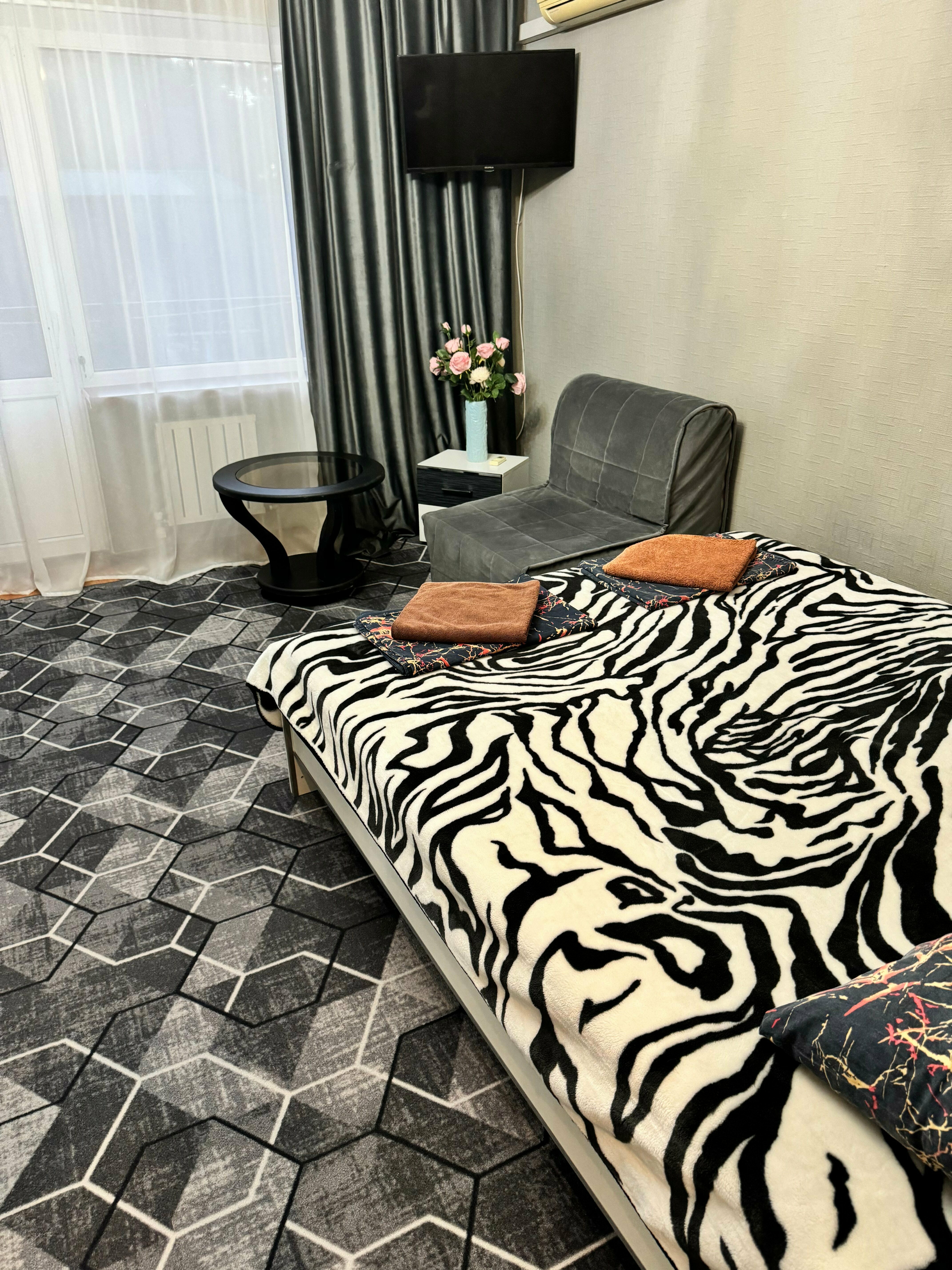 Трехместный номер с балконом