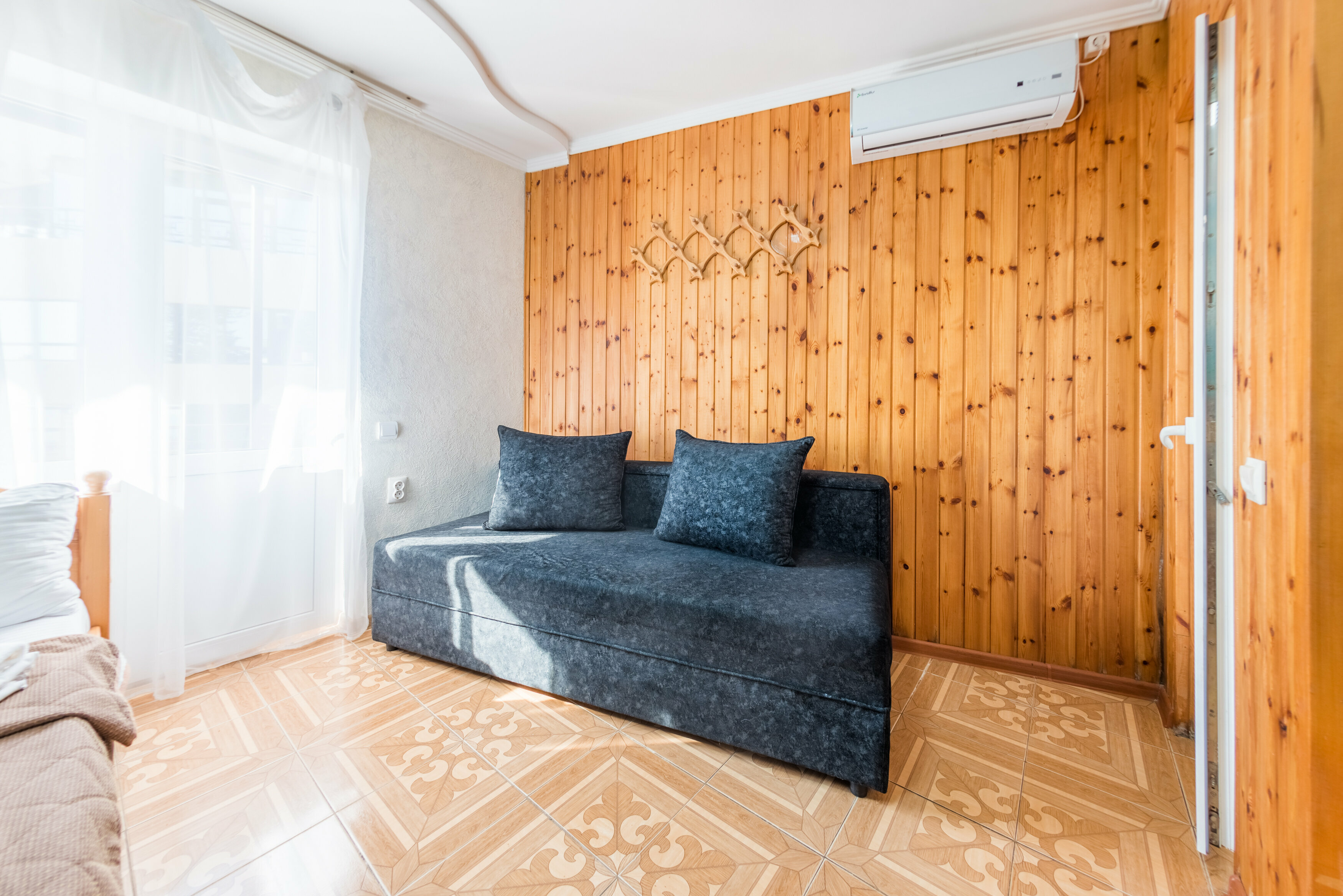 Трехместный номер с балконом