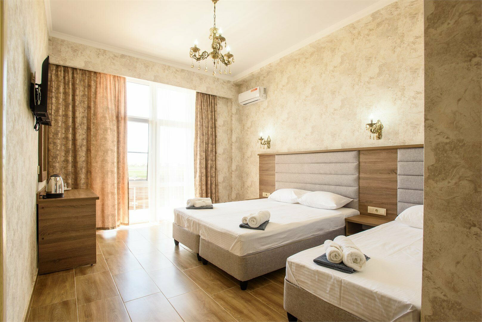 Роскошный трехместный номер