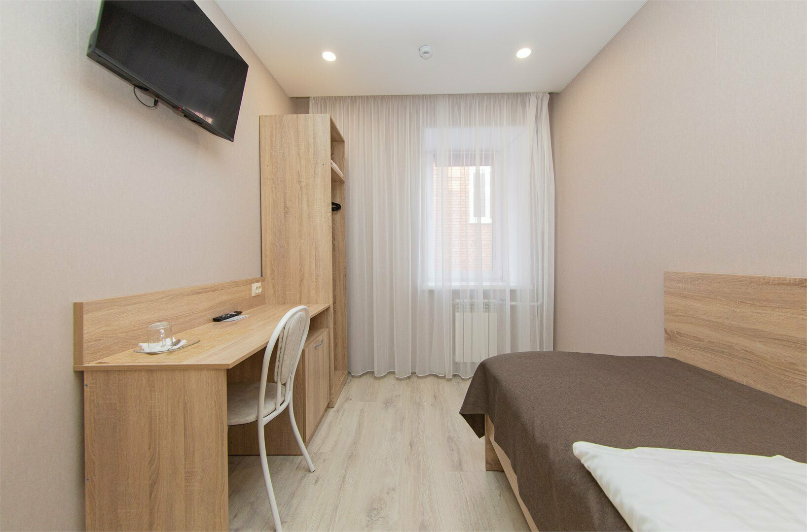 Одноместный номер с общим душем и туалетом