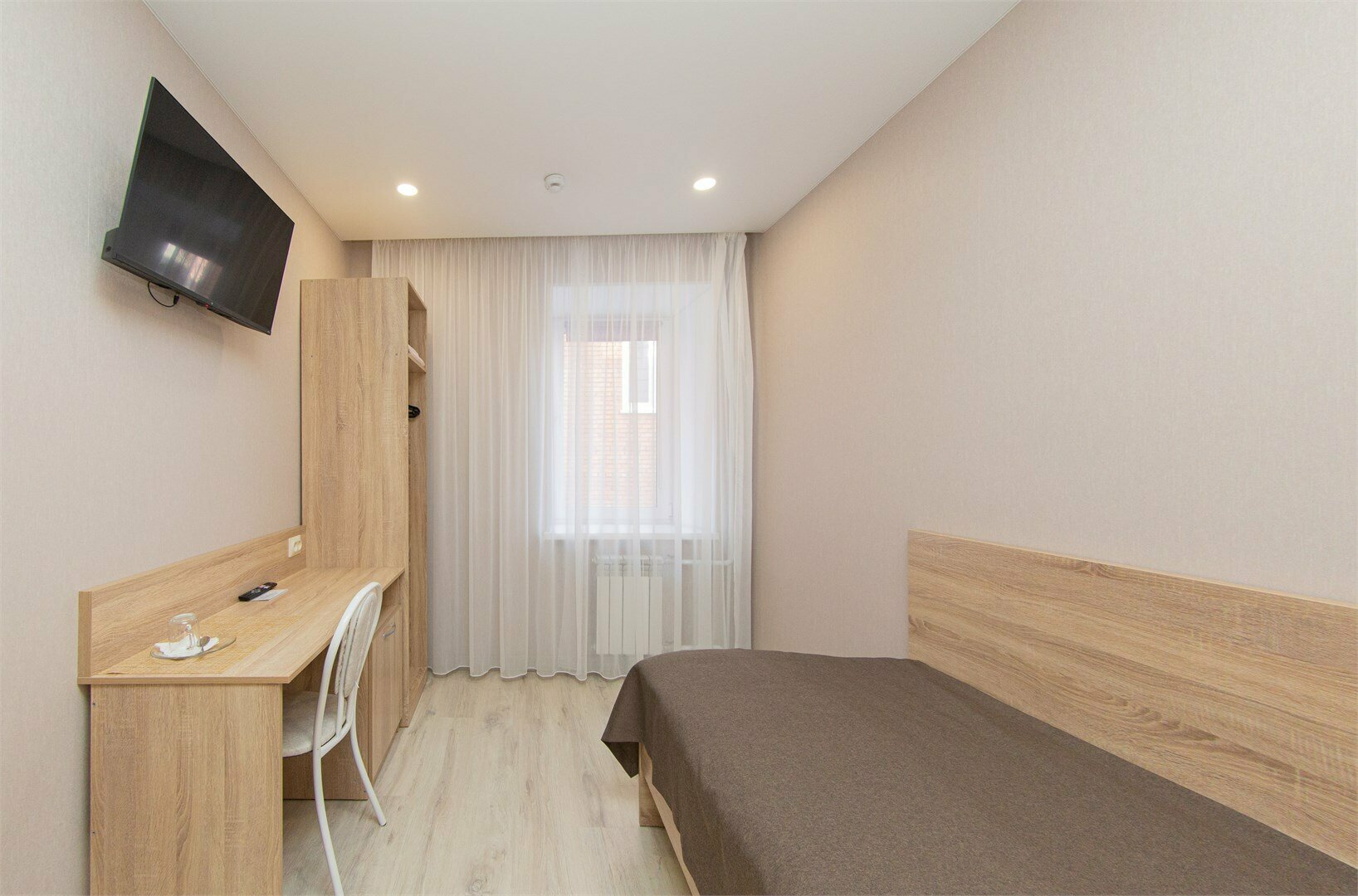 Одноместный номер с общим душем и туалетом