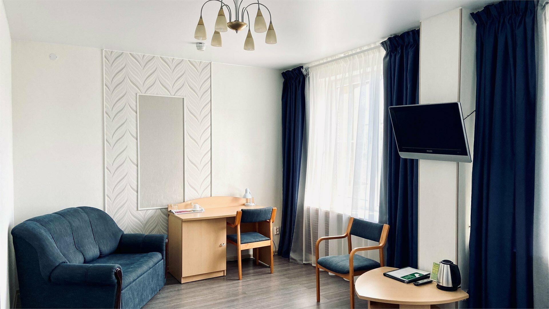 Улучшенный о одной двухспальной или двумя односпальными кроватями