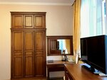 Номера Стандарт без балкона с одной совместной кроватью с видом во двор в Империал 2011