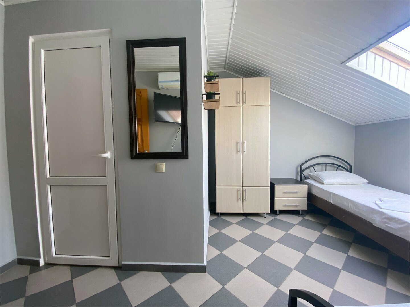 Двухместный номер с 2 отдельными кроватями и окном