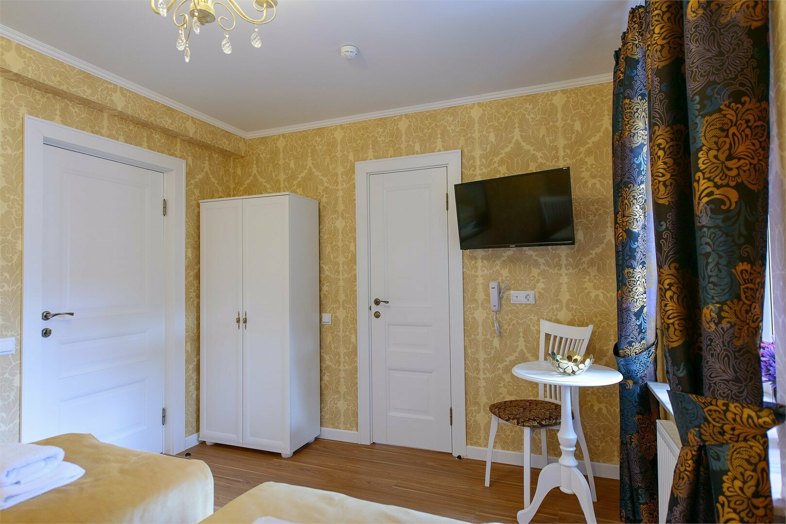 Улучшенный Двухместный (одна двуспальная или две односпальных кровати)