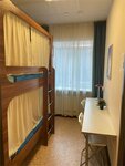 Спальное место на двухъярусной кровати в общем номере для женщин в Золотое кольцо
