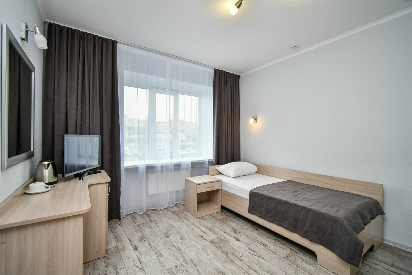 Одноместный номер с общим душем и туалетом