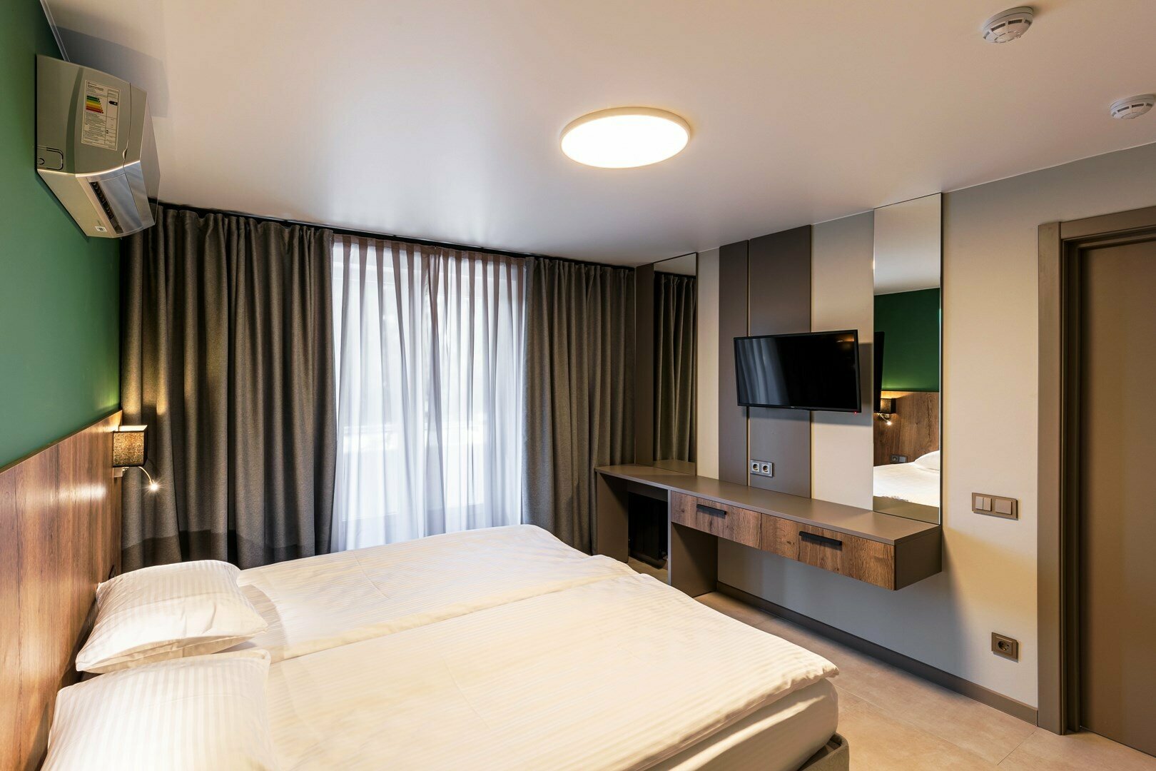 Апартаменты с 2-мя спальнями с балконом