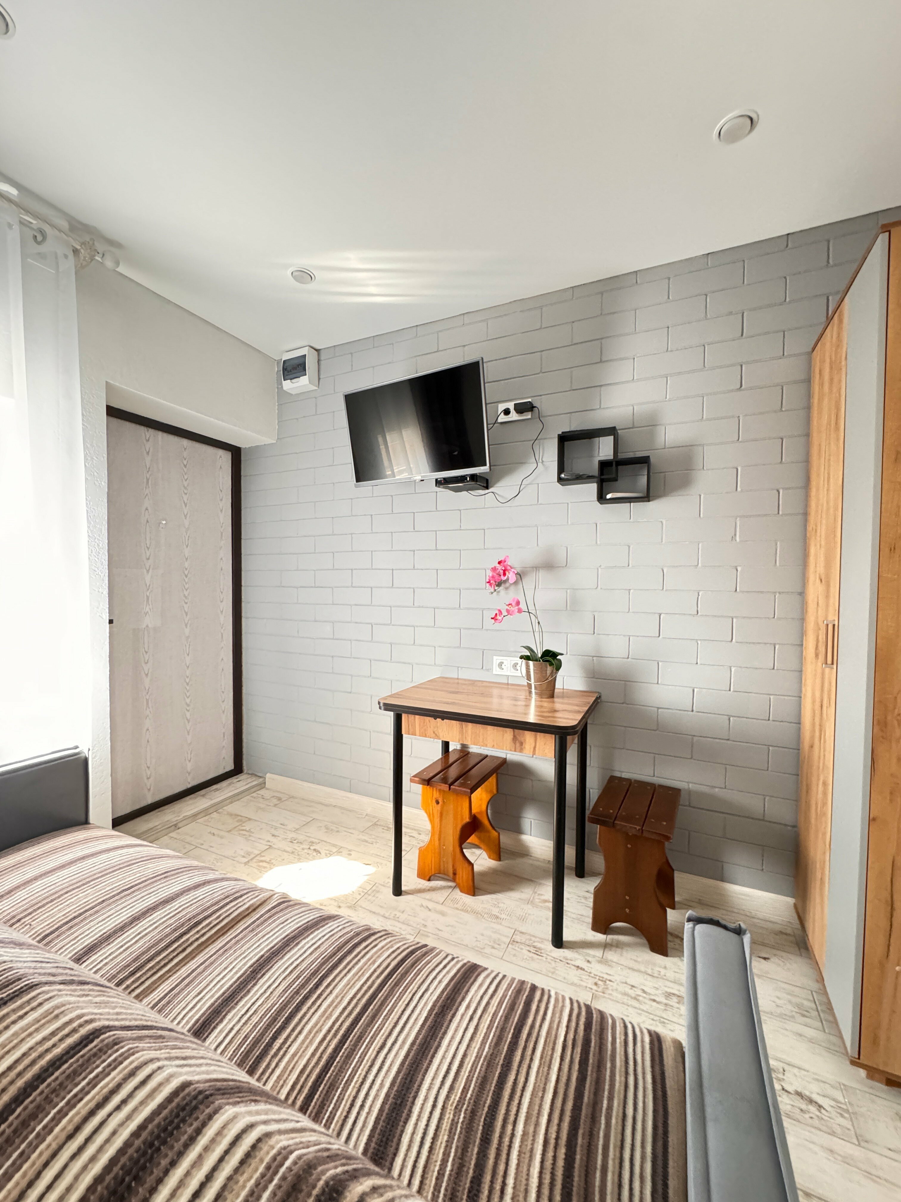 Трехместный номер с видом на сад