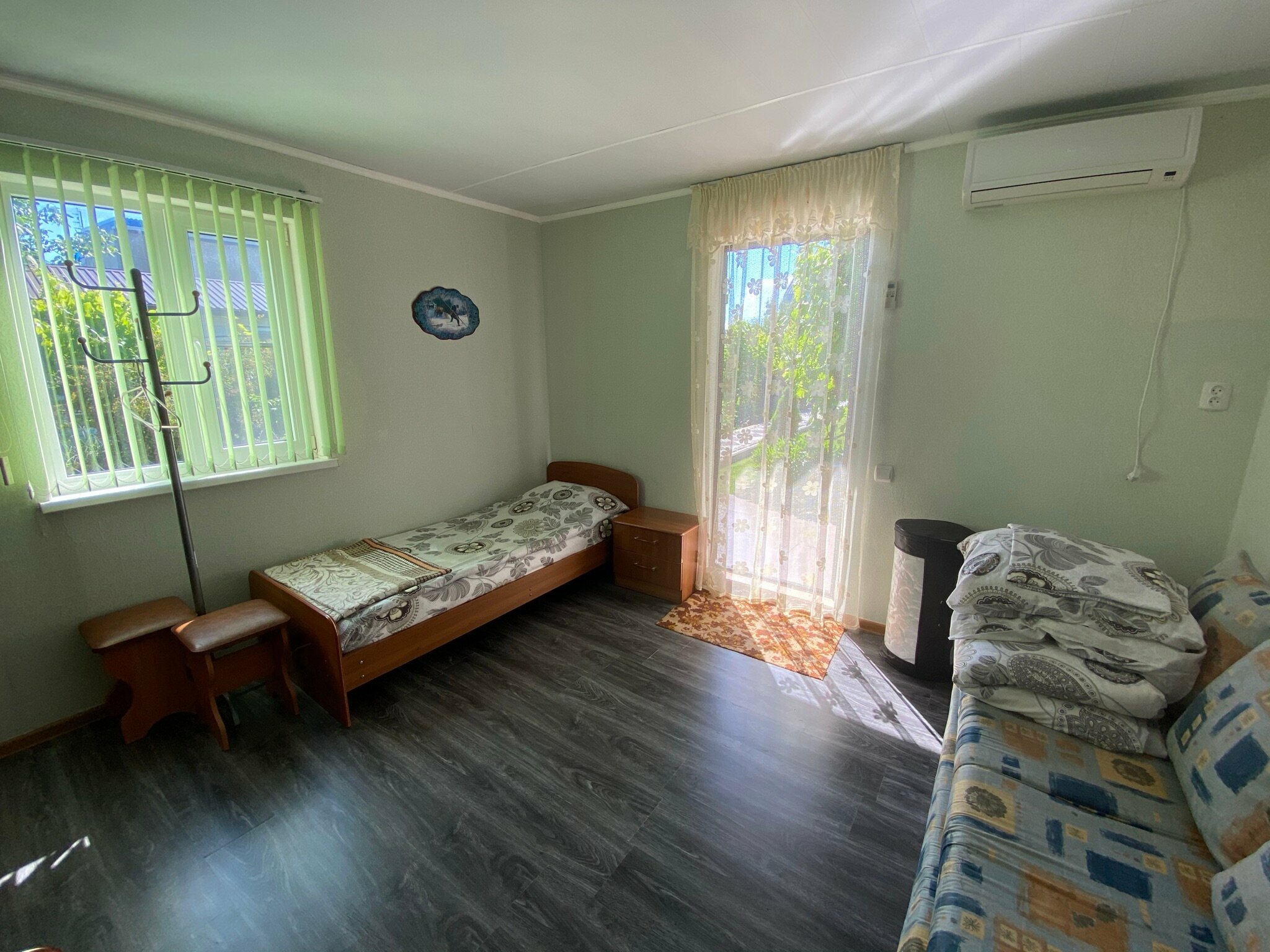 Четырехместный номер с видом на сад