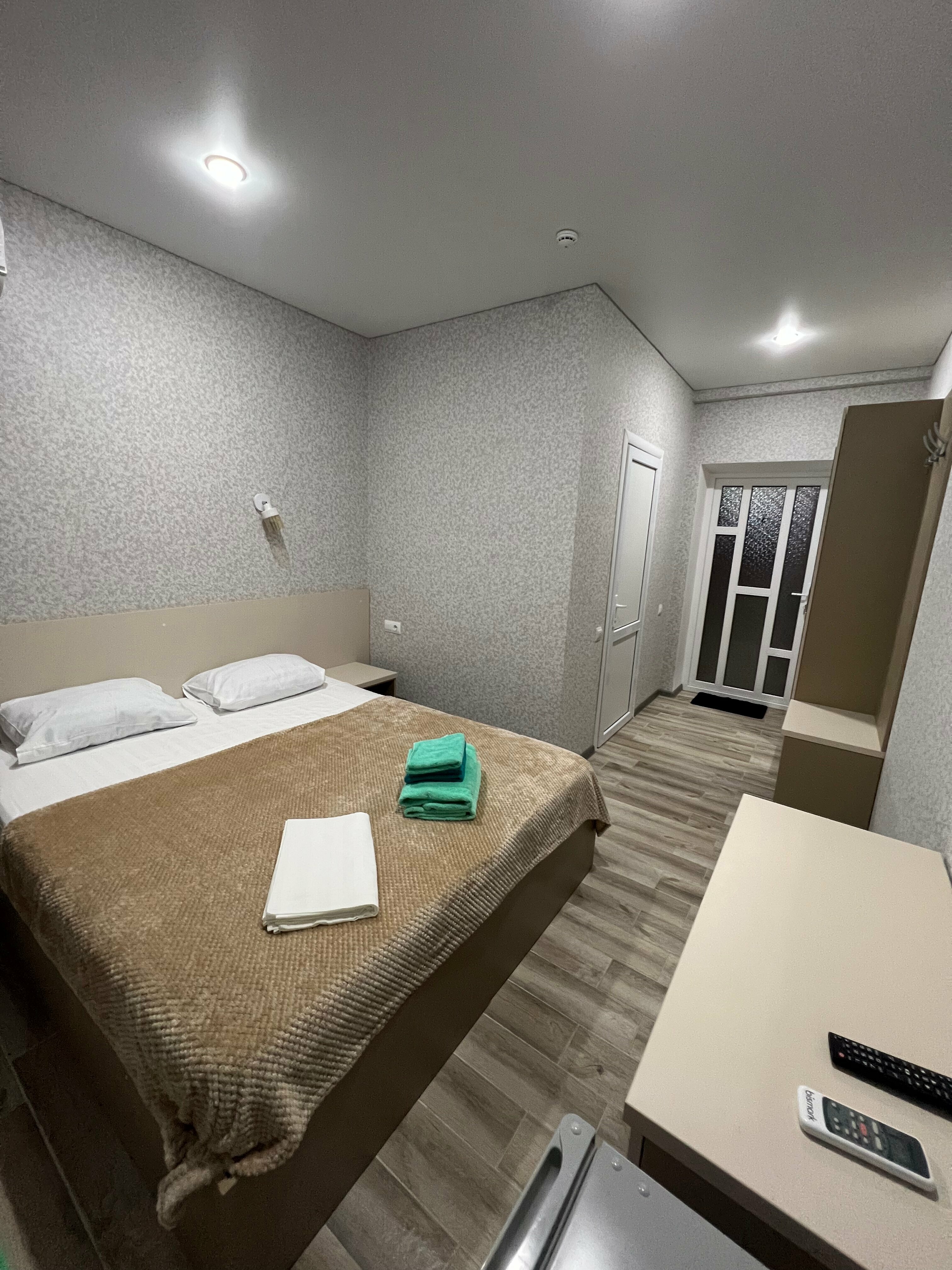 Двухместный с 2 отдельными кроватями или с 1 кроватью