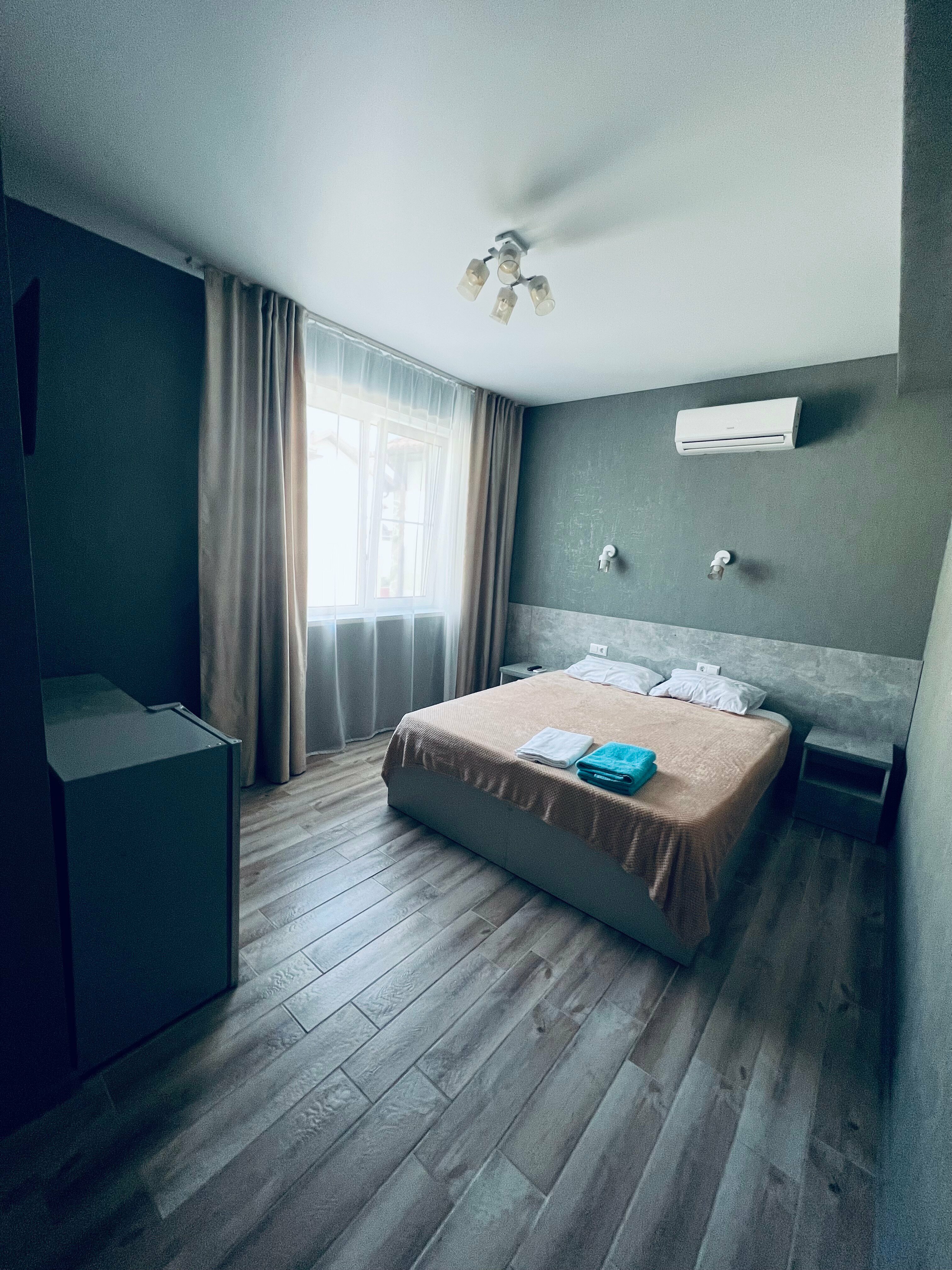 Двухместный номер с 2 отдельными кроватями или с 1 кроватью