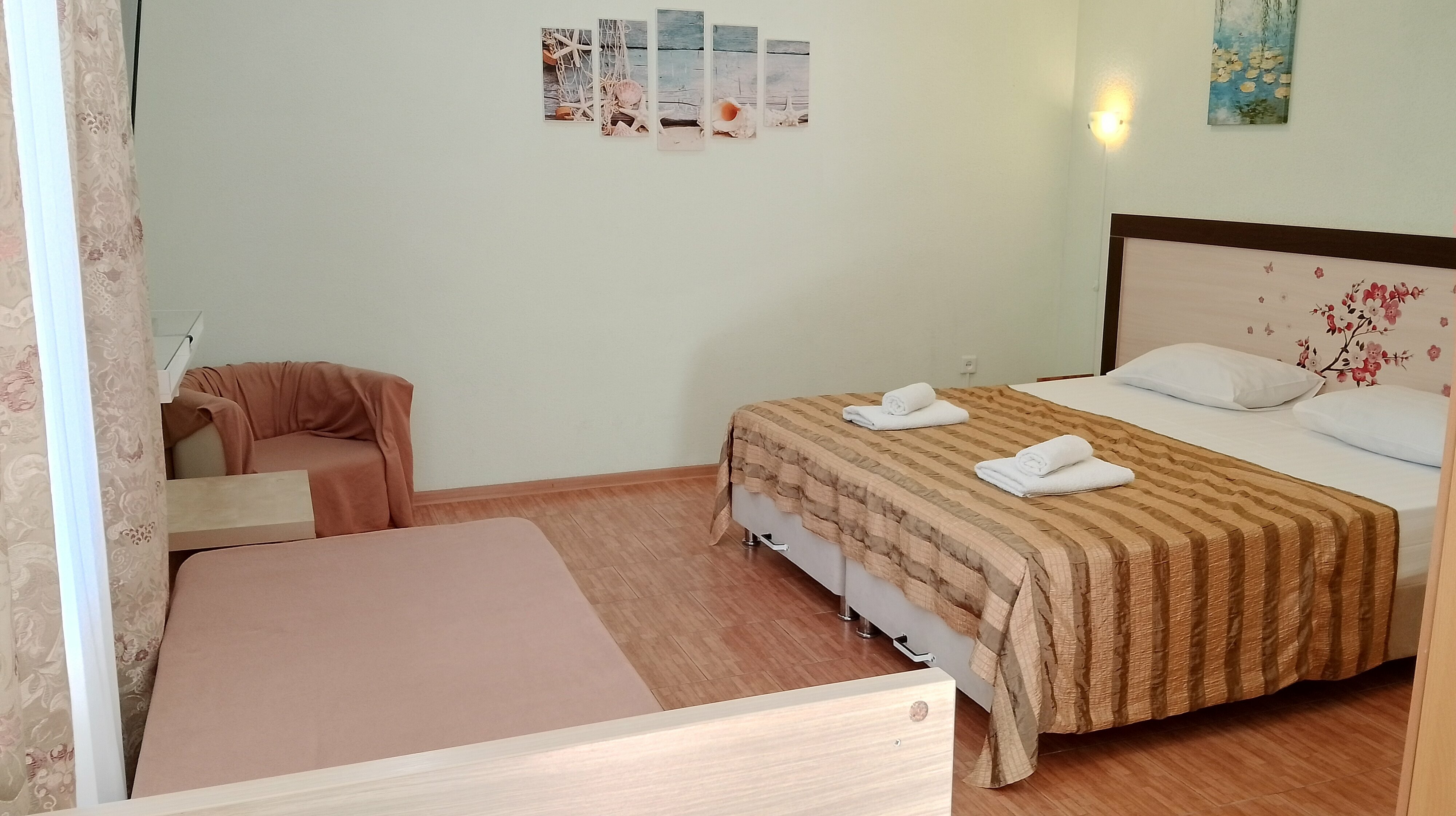 Улучшенный трехместный номер