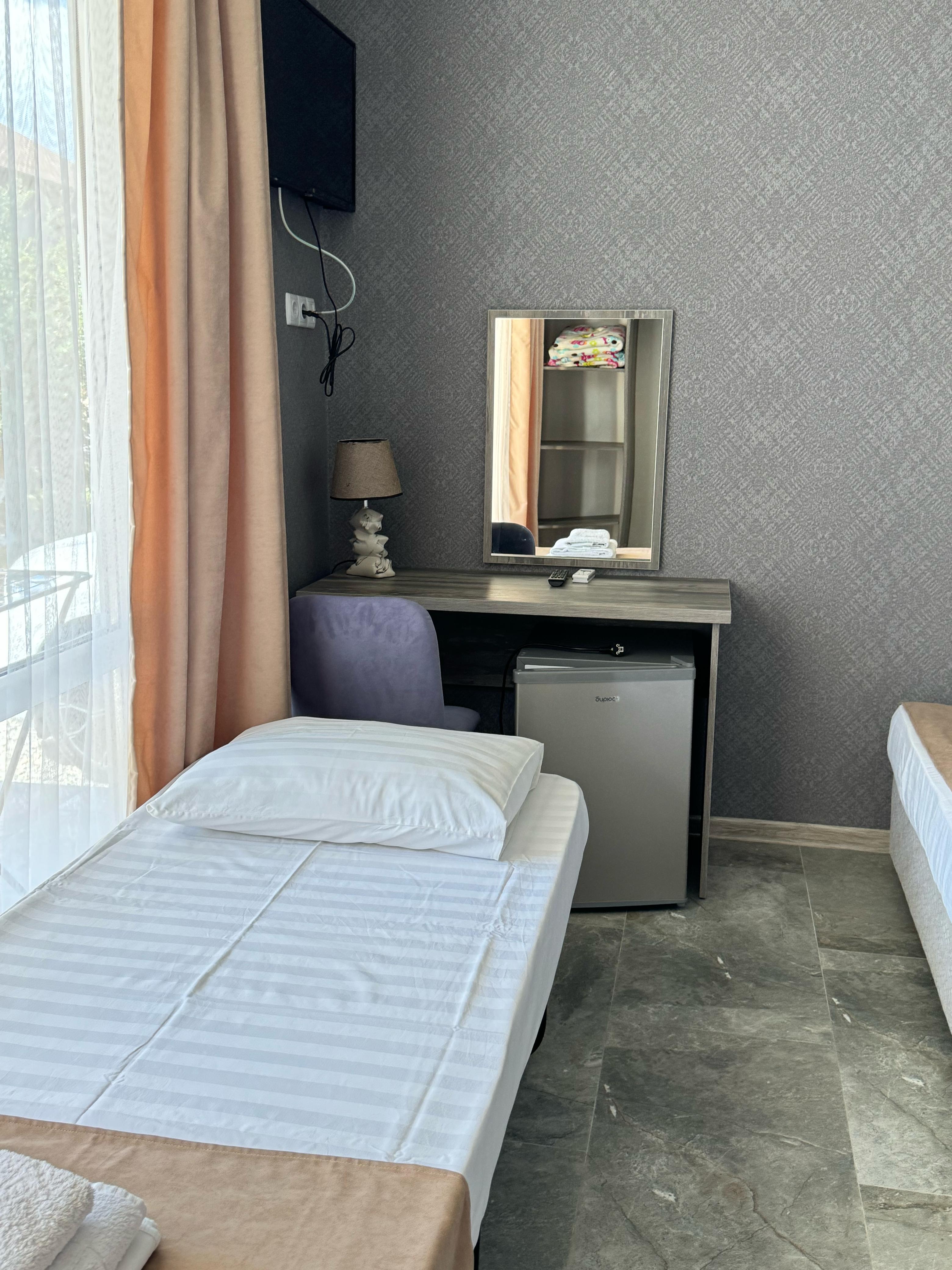 Четырехместный номер Делюкс