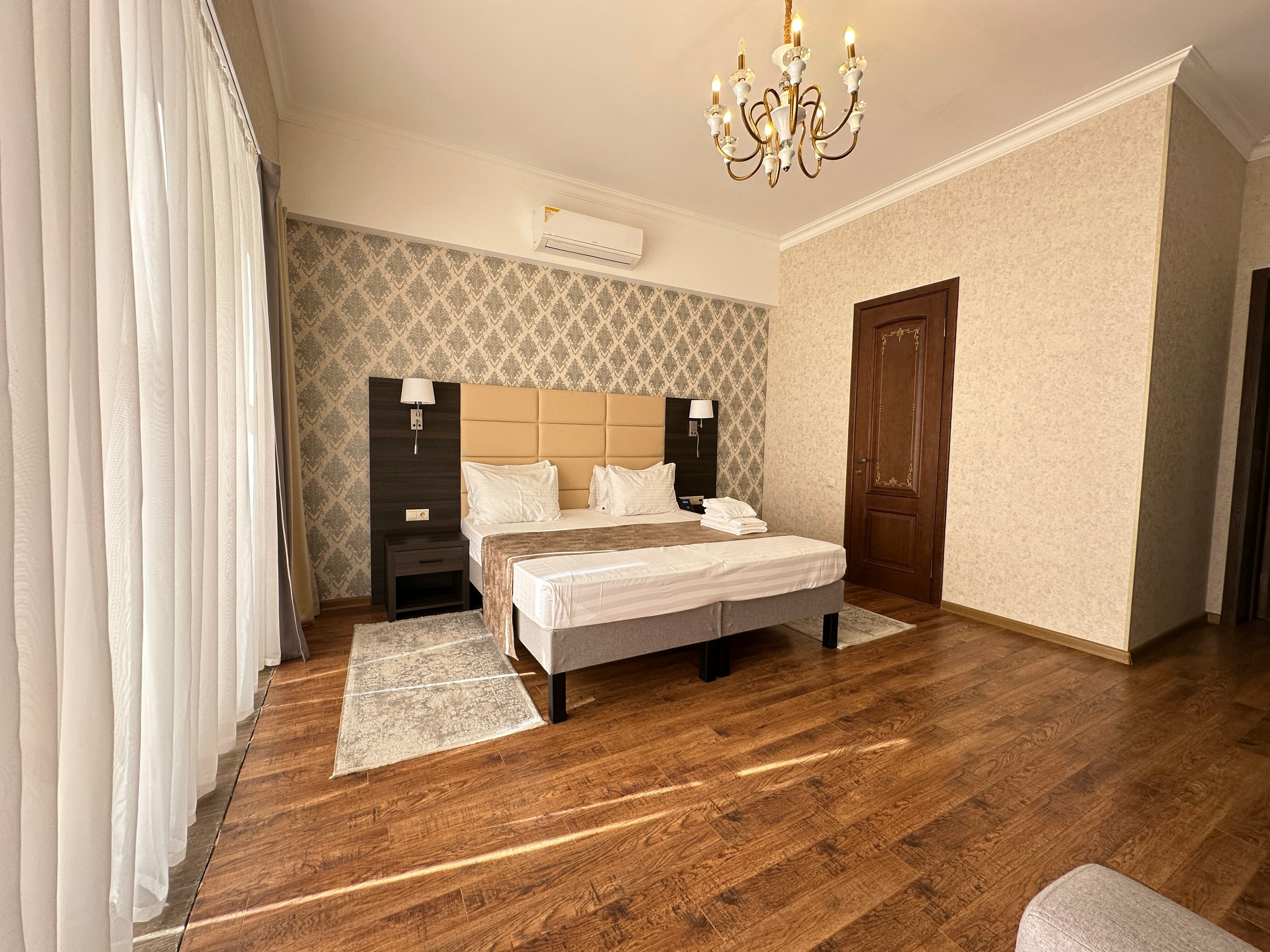 Улучшенный номер с кроватью размера «king-size» или 2 отдельными кроватями