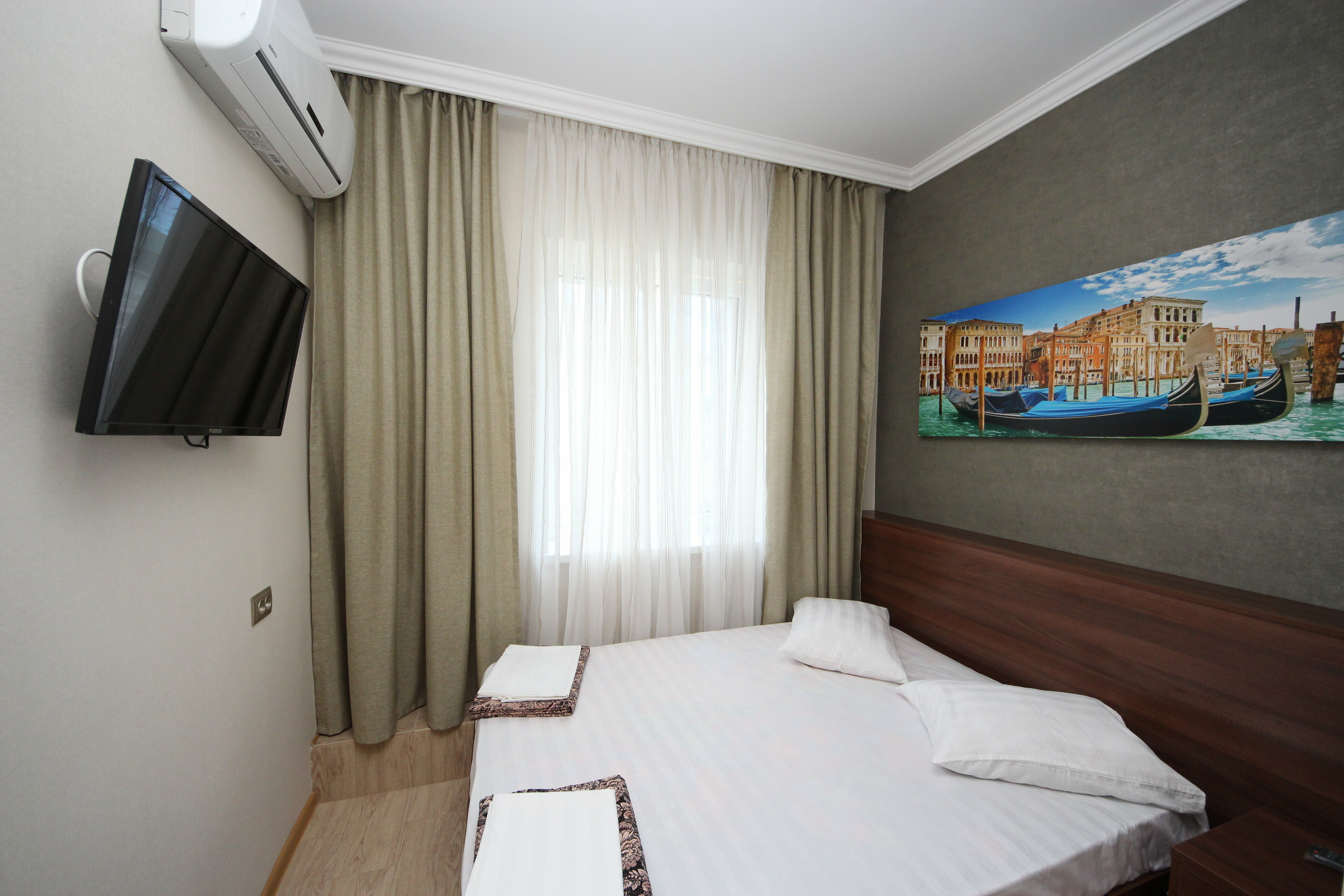 Стандартный двухместный номер с 1 кроватью или 2 отдельными кроватями с собственной ванной комнатой