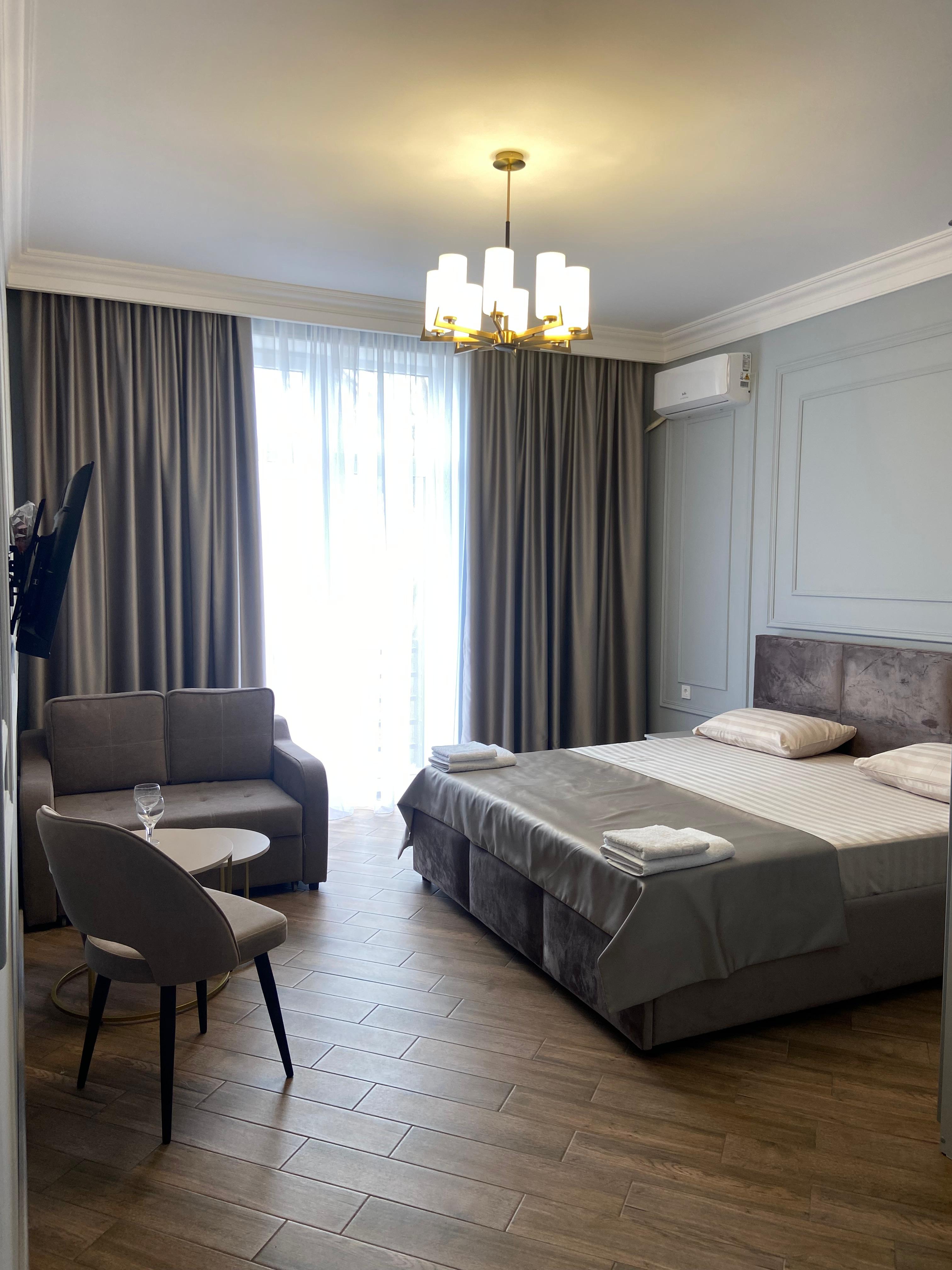 Улучшенный трехместный номер с видом на море