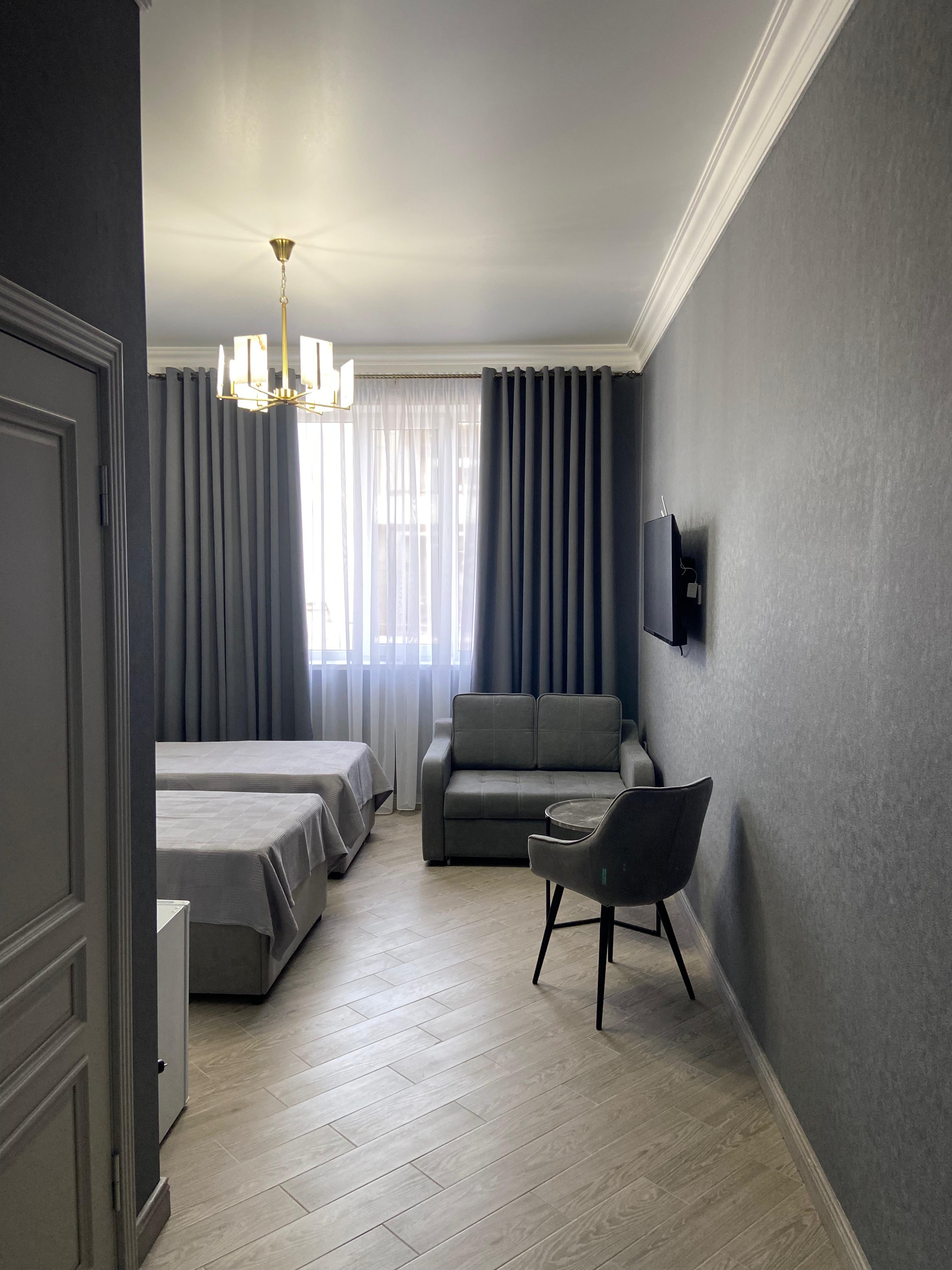 Улучшенный трехместный номер