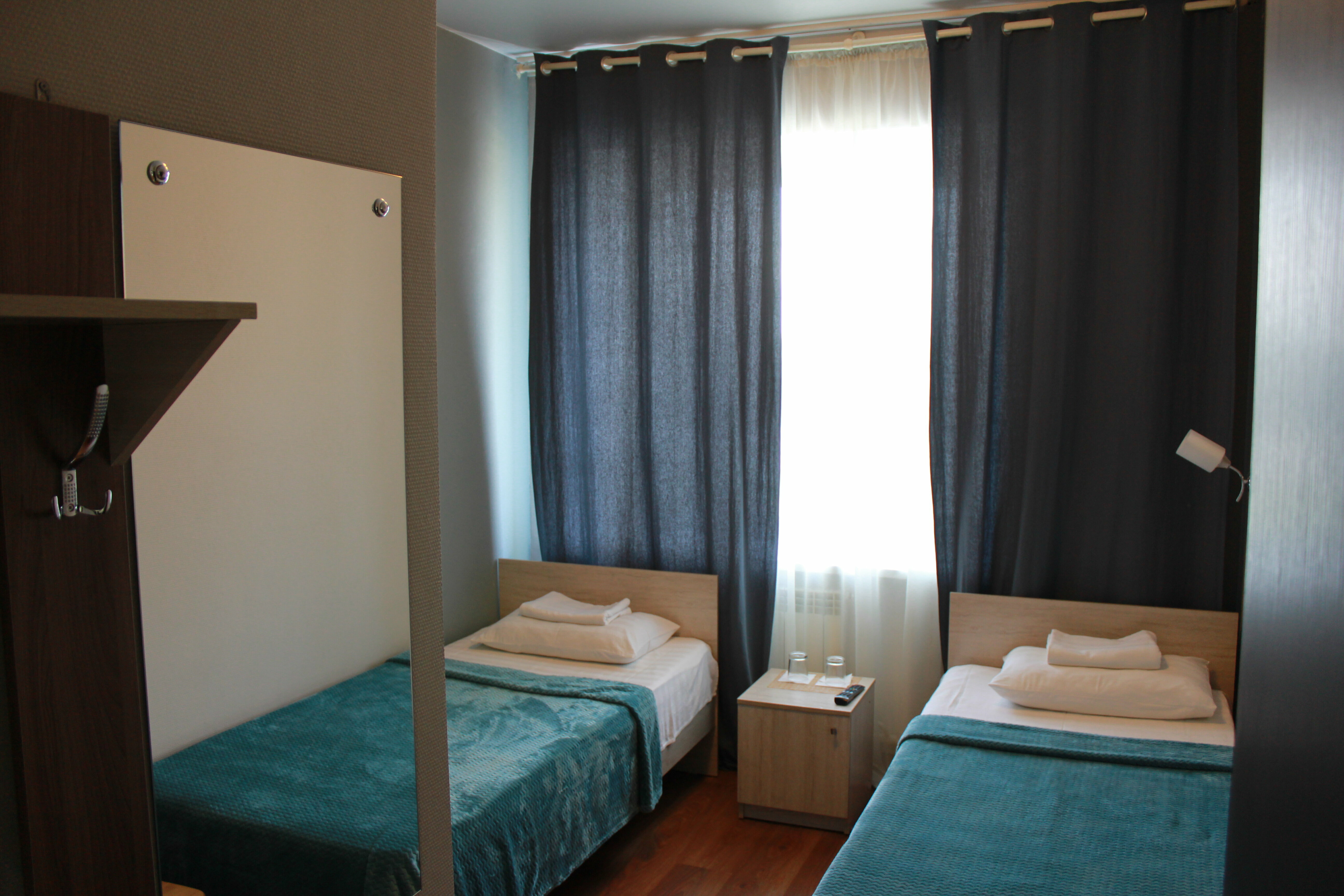 Номер первой категории с двумя кроватями и  с полным санузлом в номере