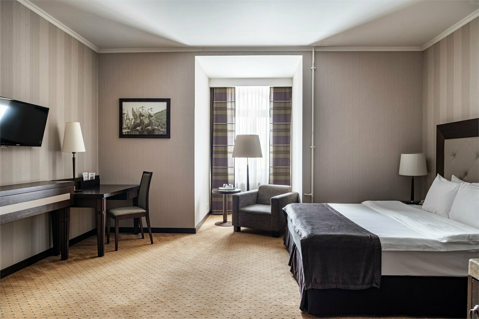 Представительский номер с одной большой или двумя раздельными кроватями