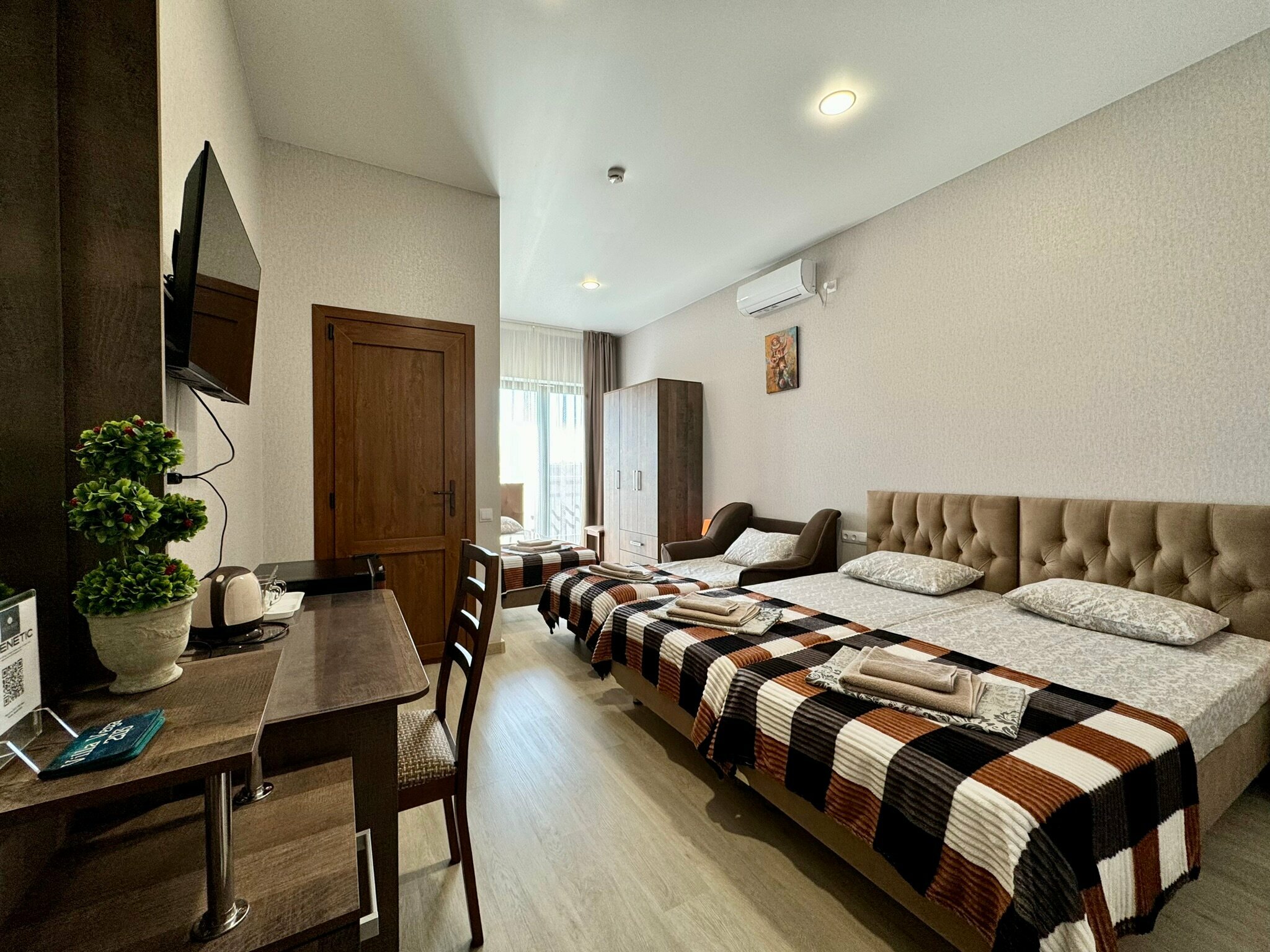 Четырехместный номер Делюкс