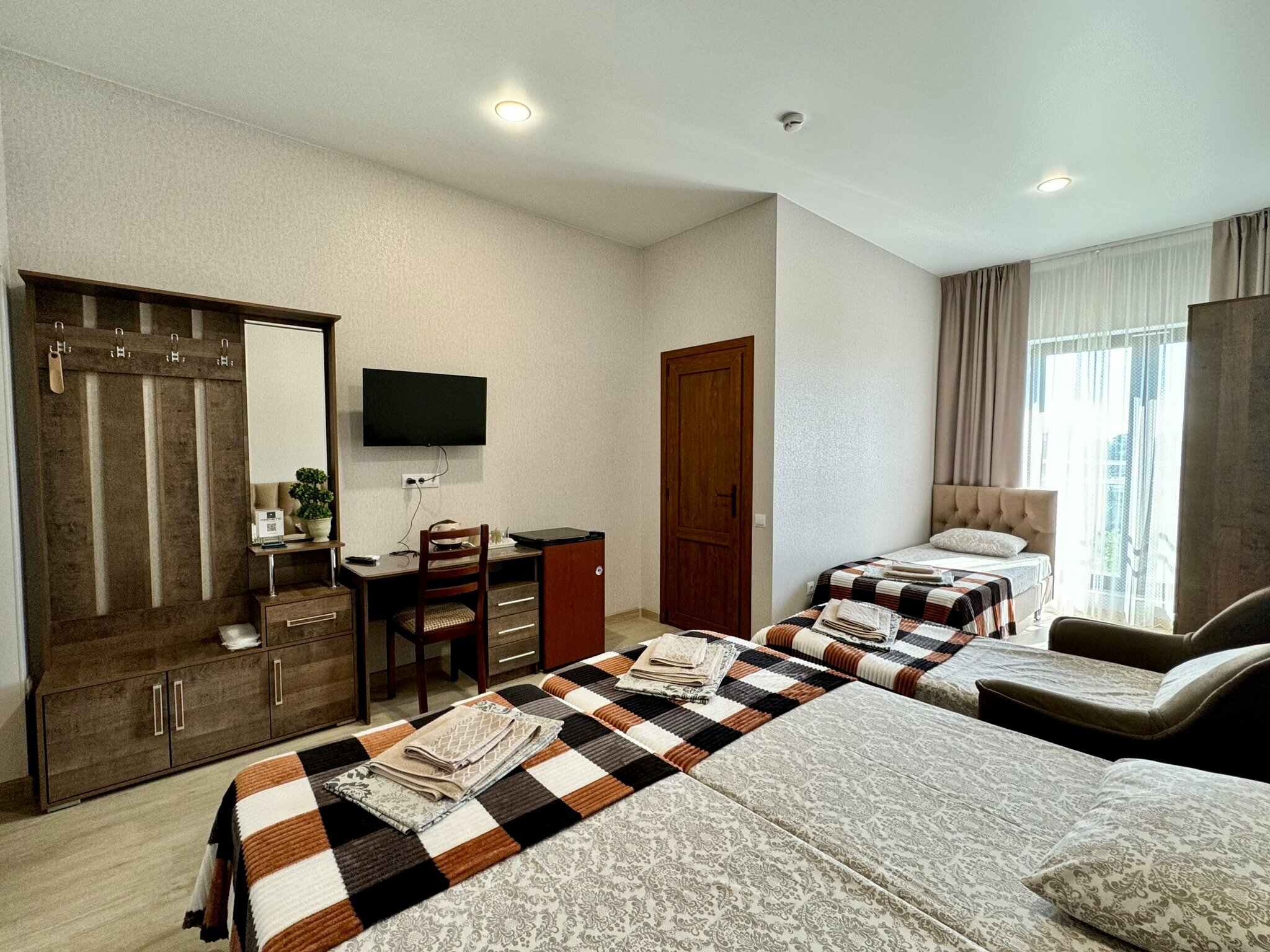 Четырехместный номер Делюкс