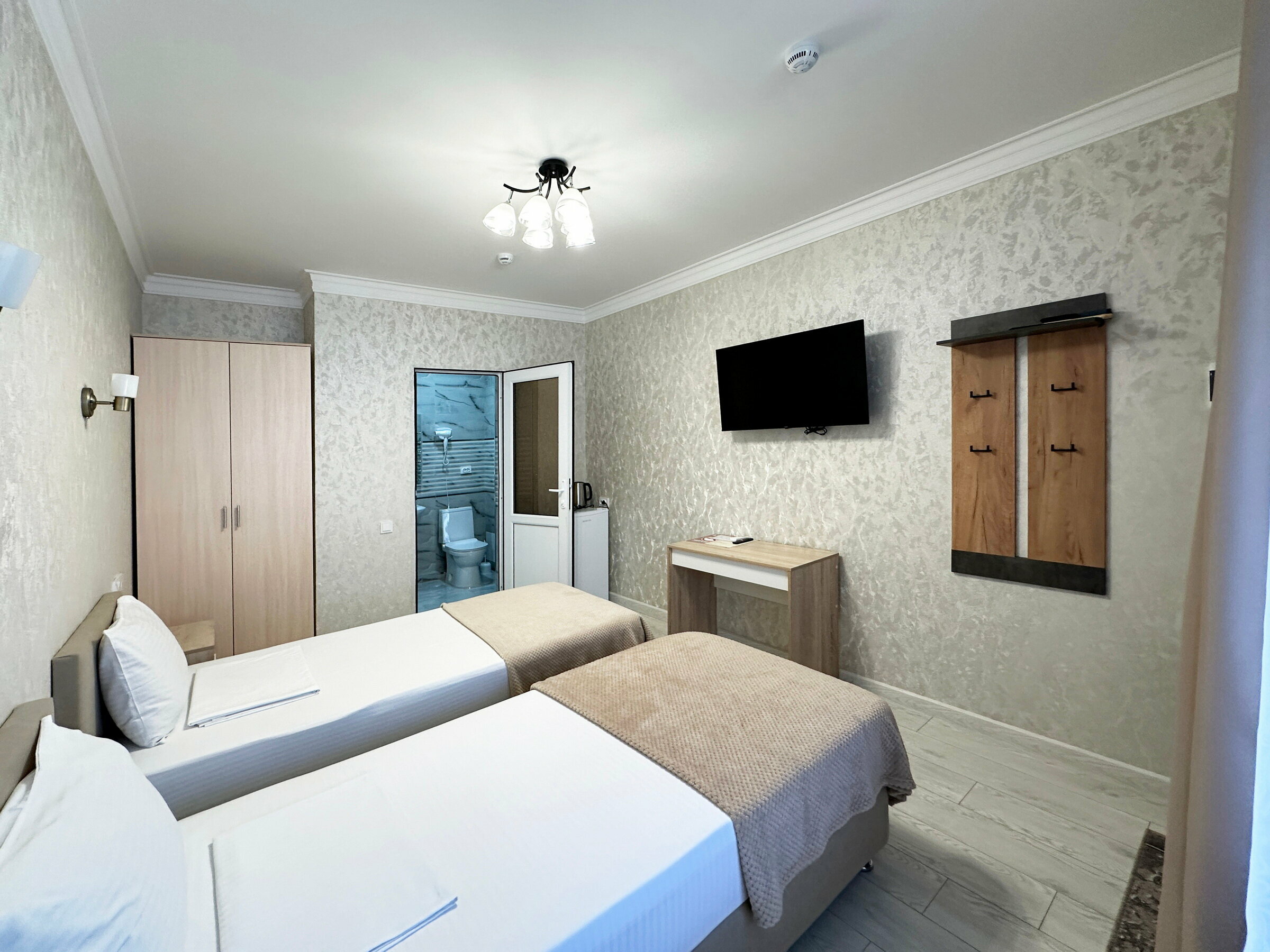 Двухместный номер с 2 отдельными кроватями и окном