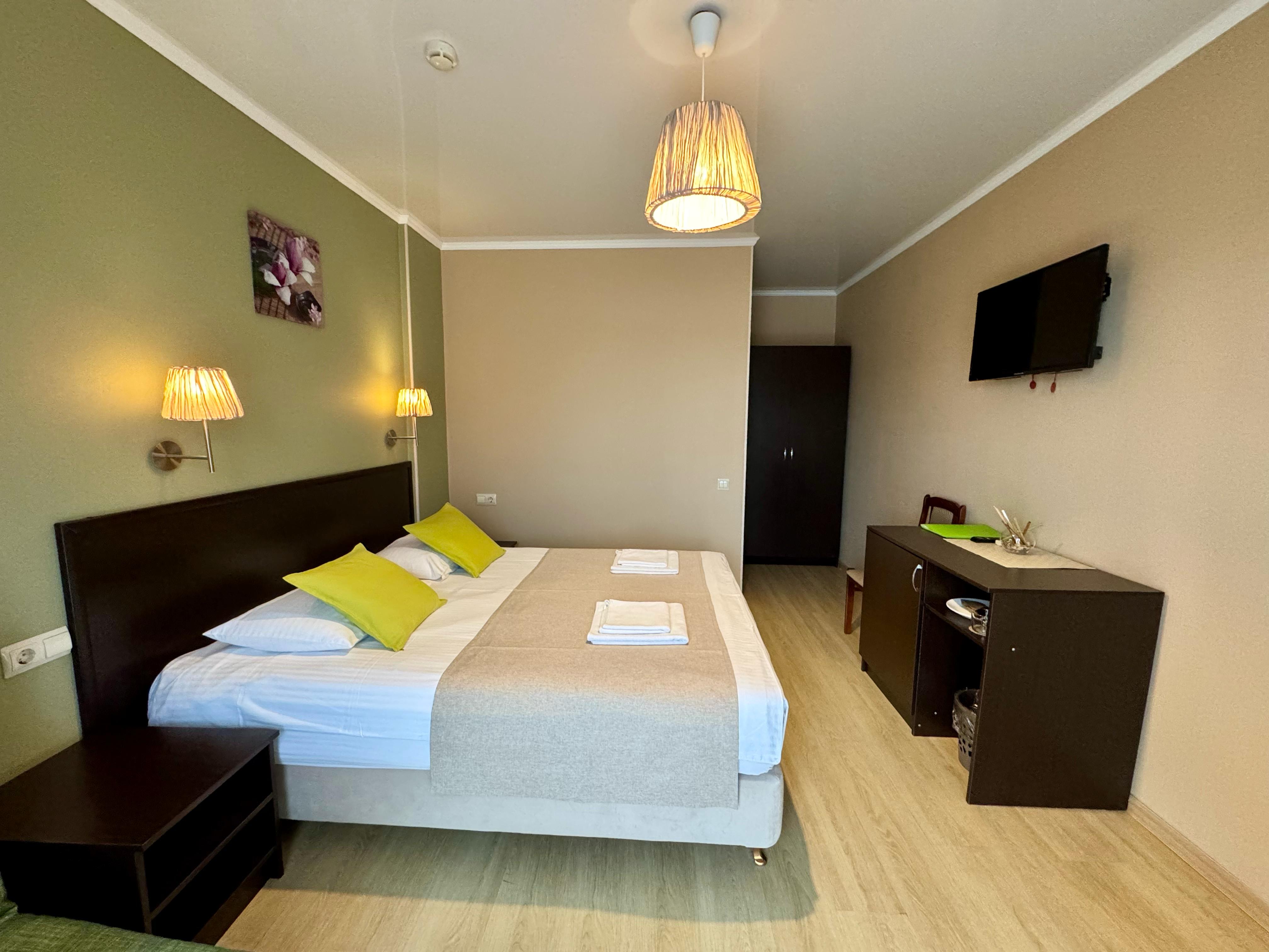 Двухместный с общим балконом и креслом-кроватью