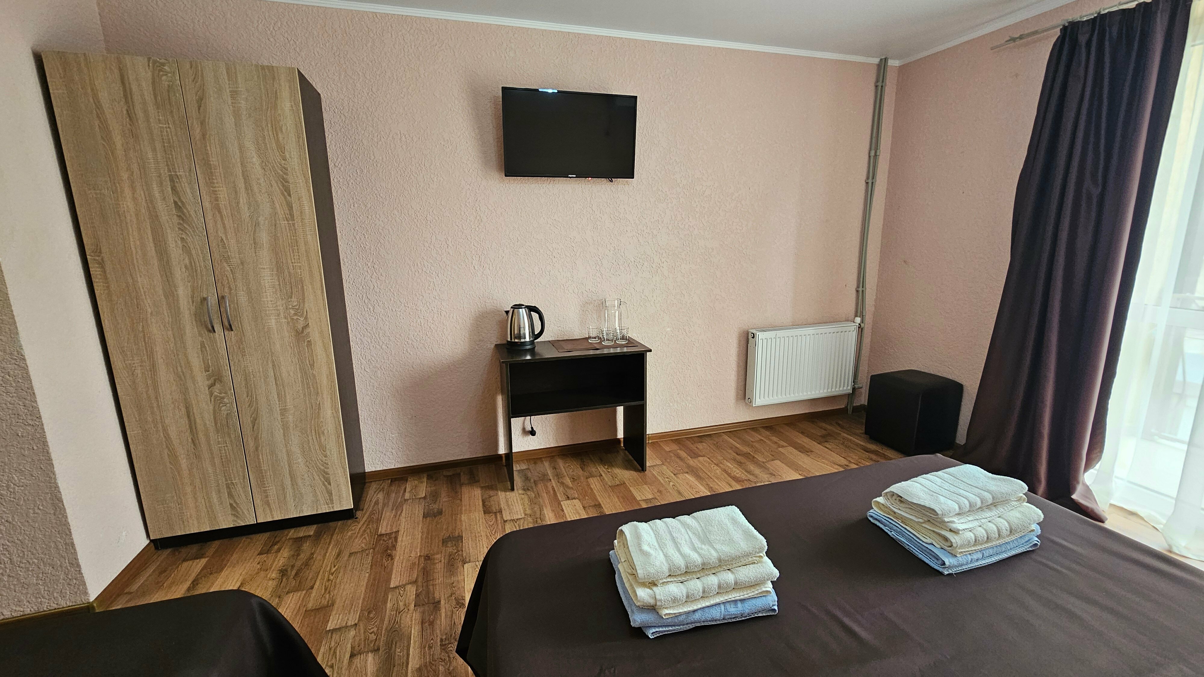 Трехместный номер с балконом