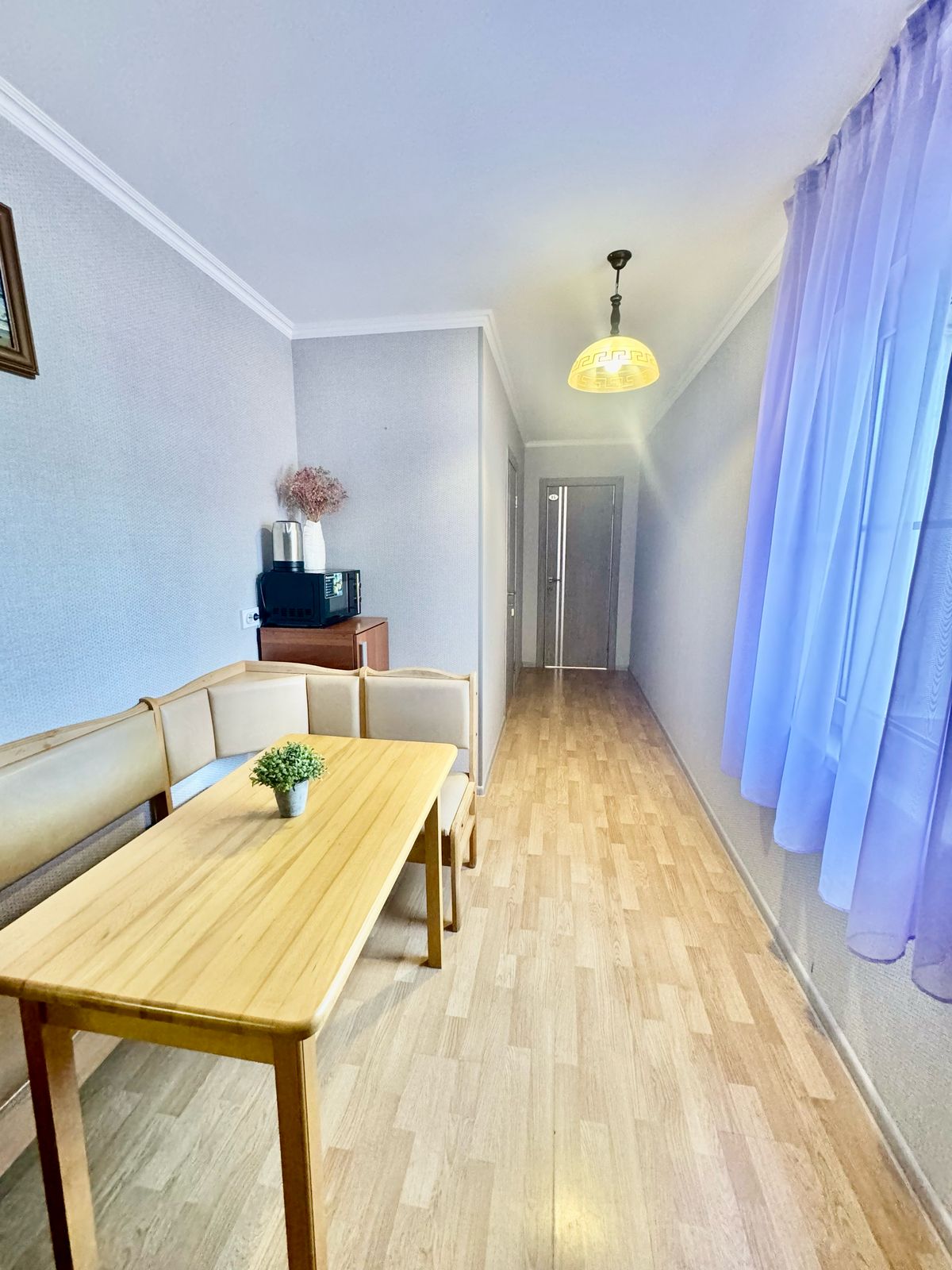 Четырехместный номер эконом-класса с общей ванной комнатой