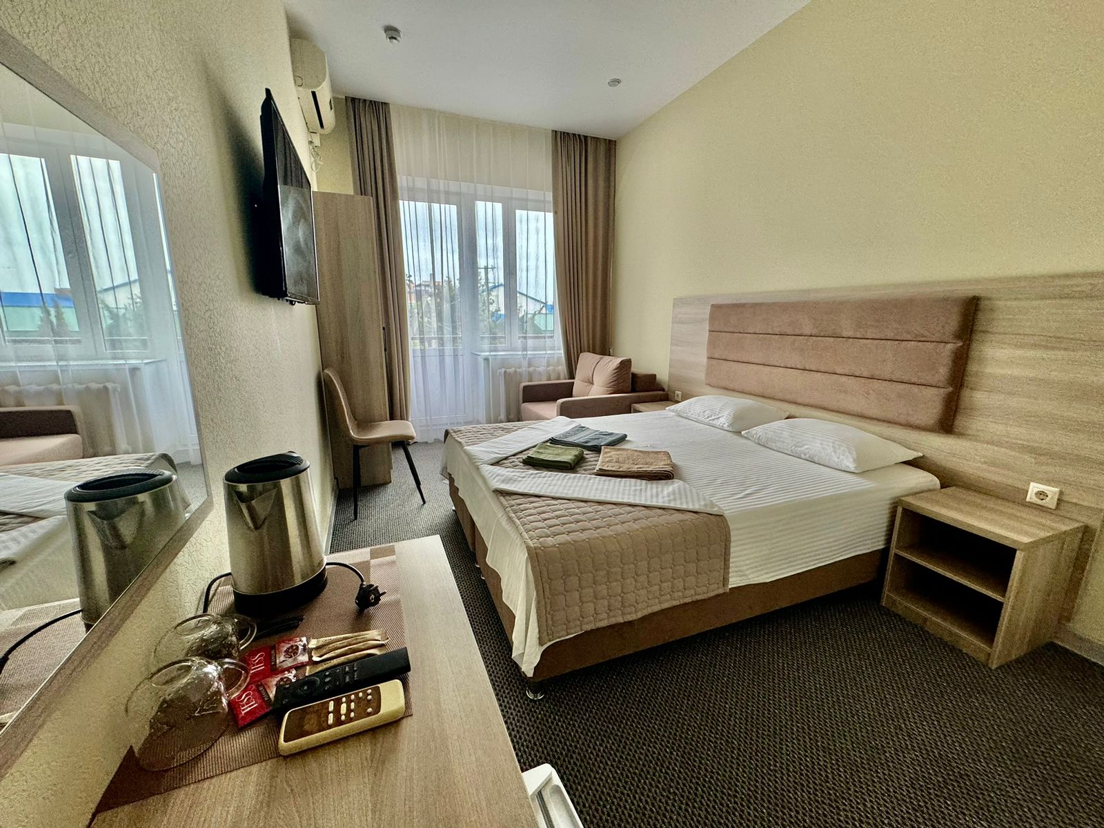 Трехместный номер с балконом