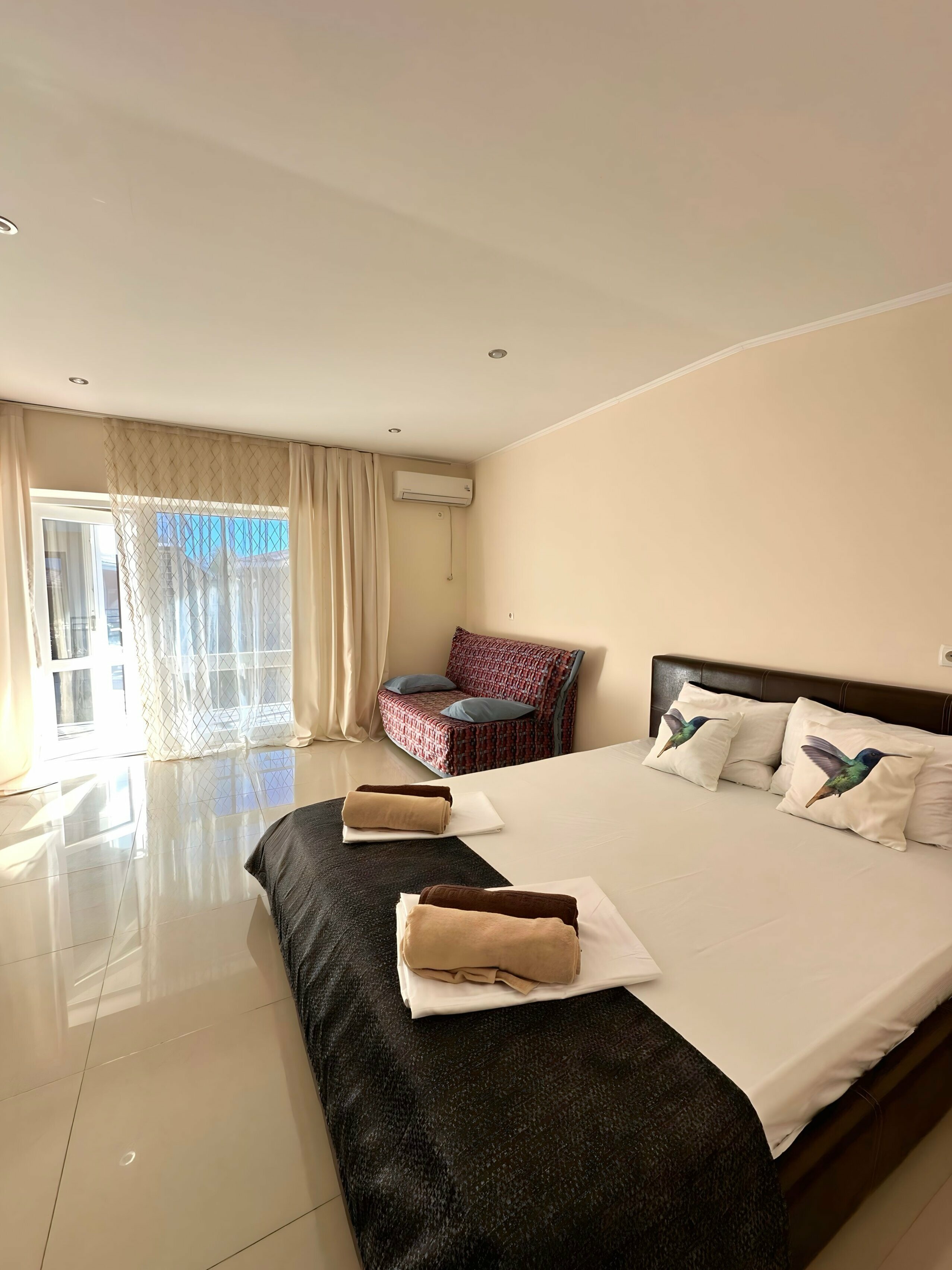 Трехместный номер Делюкс